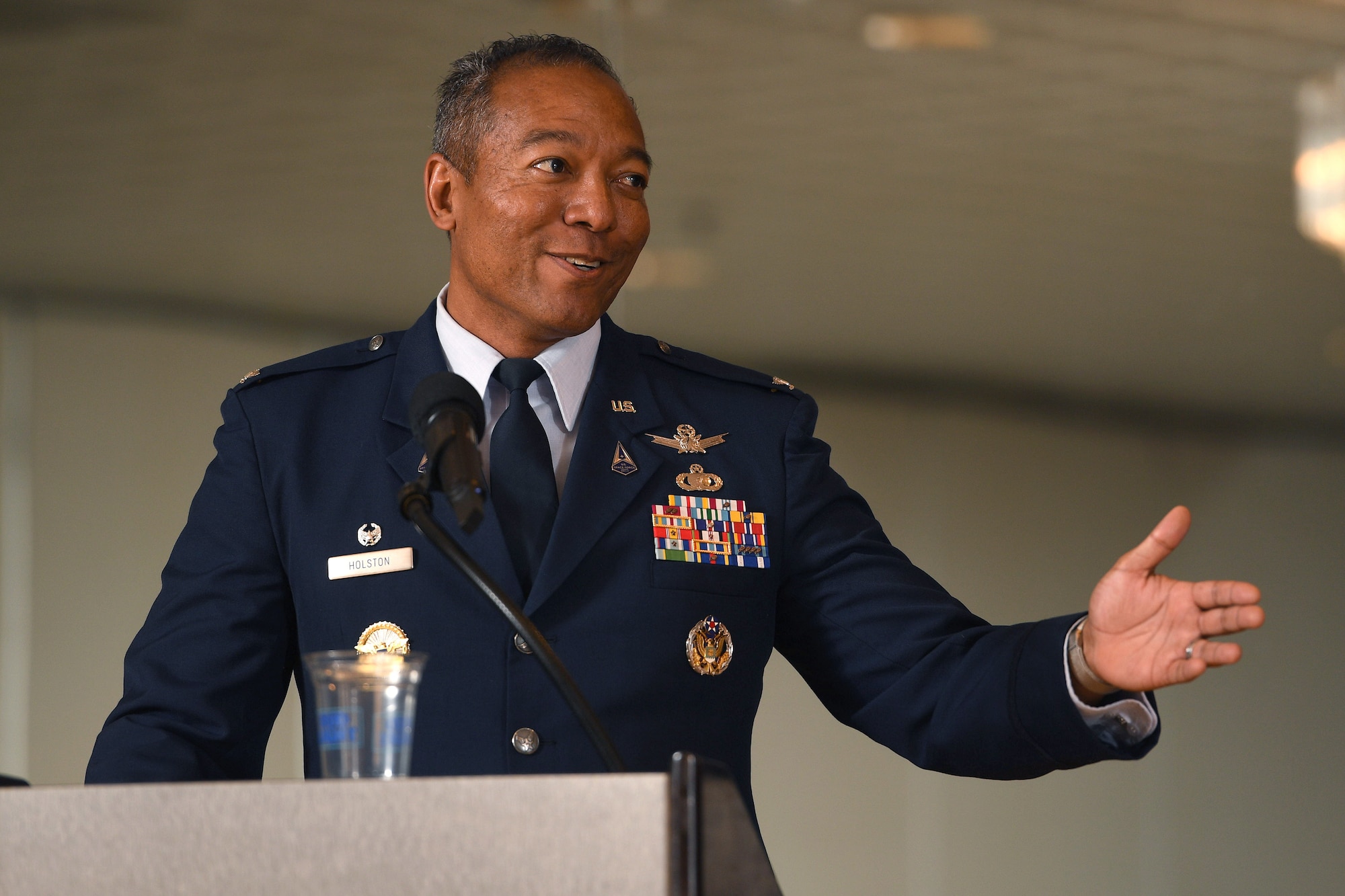 man speaking at podium