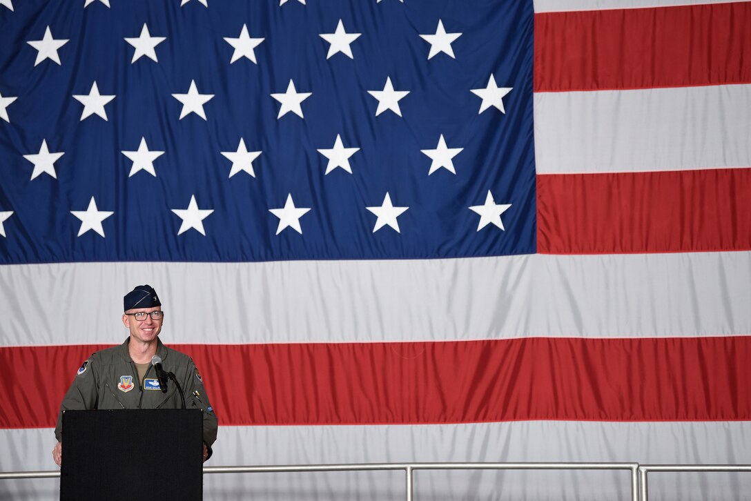 Col. John Galloway Jr., 495th Fighter Group commander, addresses the audience after assuming command during a change of command ceremony at Shaw Air Force Base, South Carolina, June 29, 2022. Col. Mark Massaro relinquished command to Galloway. Brig. Gen. David Mineau, 15th Air Force vice commander, presided over the ceremony. (U.S. Air Force photo by Master Sgt. Andrew Satran)