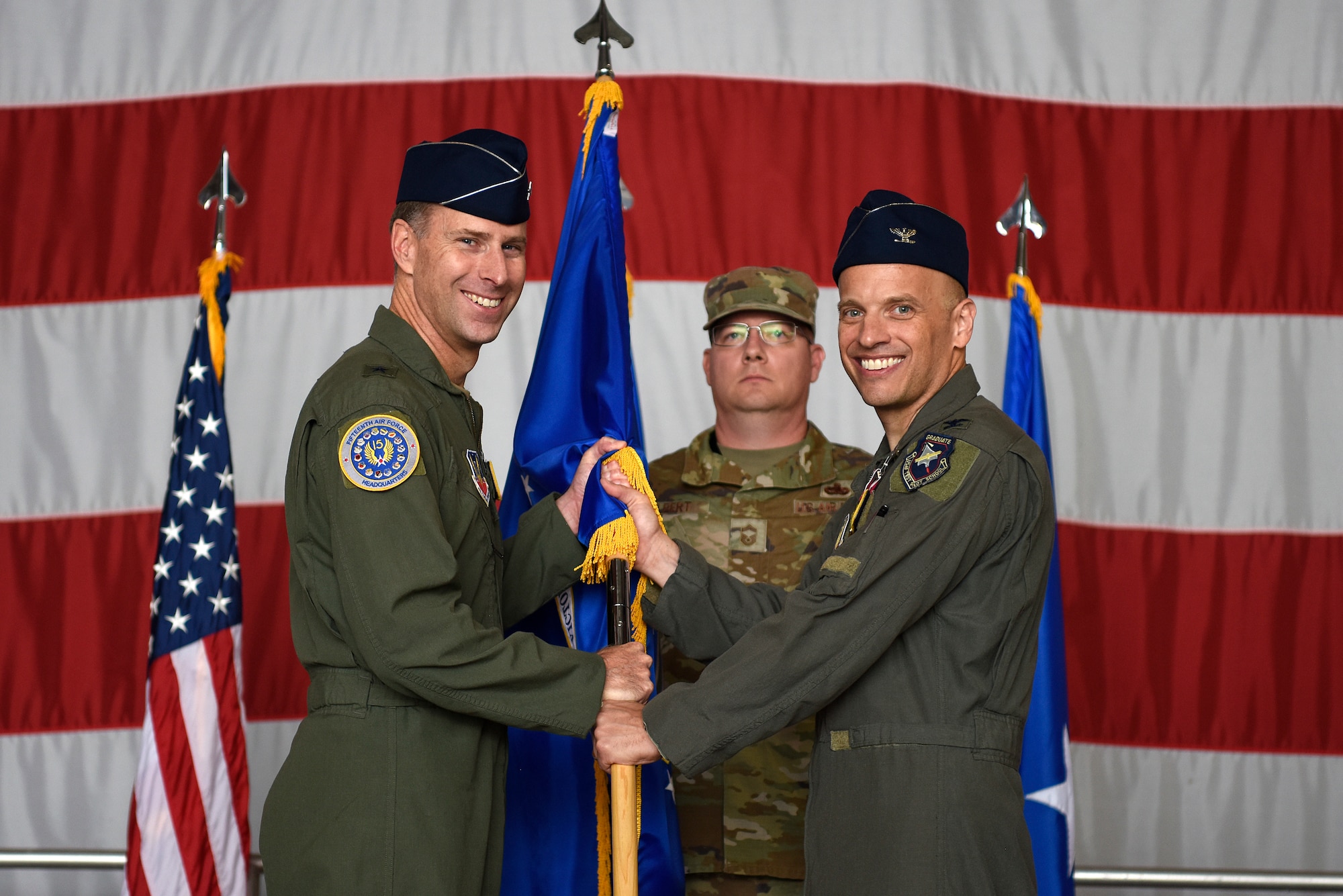 Col. Mark Massaro relinquished command of the 495th Fighter Group to Col. John Galloway Jr. during a change of command ceremony at Shaw Air Force Base, South Carolina, June 29, 2022. Brig. Gen. David Mineau, 15th Air Force vice commander, presided over the ceremony. (U.S. Air Force photo by Master Sgt. Andrew Satran)