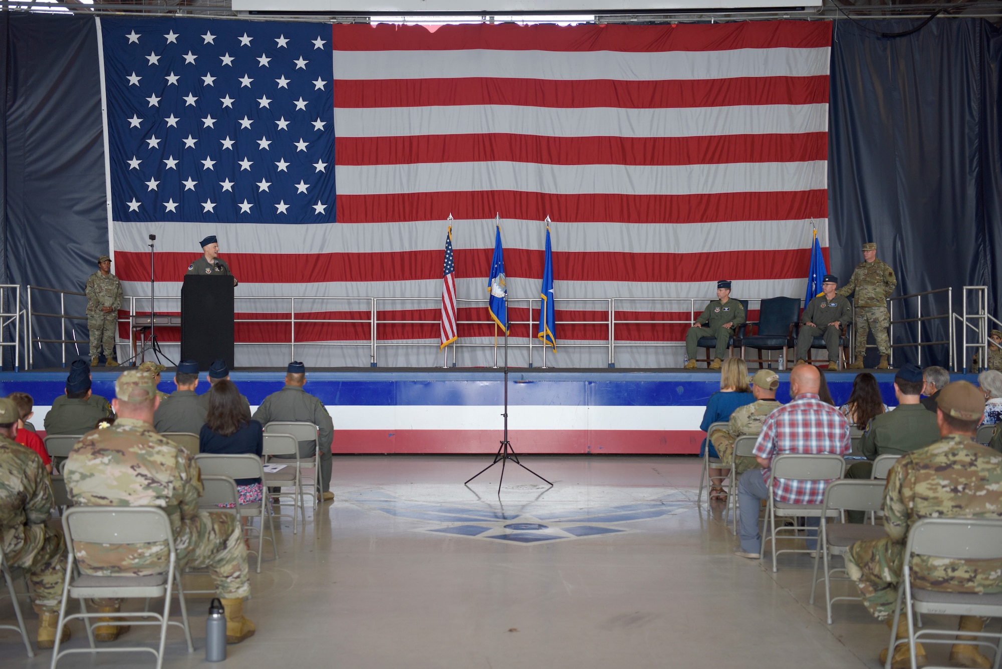 Col. Mark Massaro addresses the 495th Fighter Group during a change of command ceremony where he relinquished command to Col. John Galloway Jr. at Shaw Air Force Base, South Carolina, June 29, 2022. Brig. Gen. David Mineau, 15th Air Force vice commander, presided over the ceremony. (U.S. Air Force photo by Master Sgt. Andrew Satran)