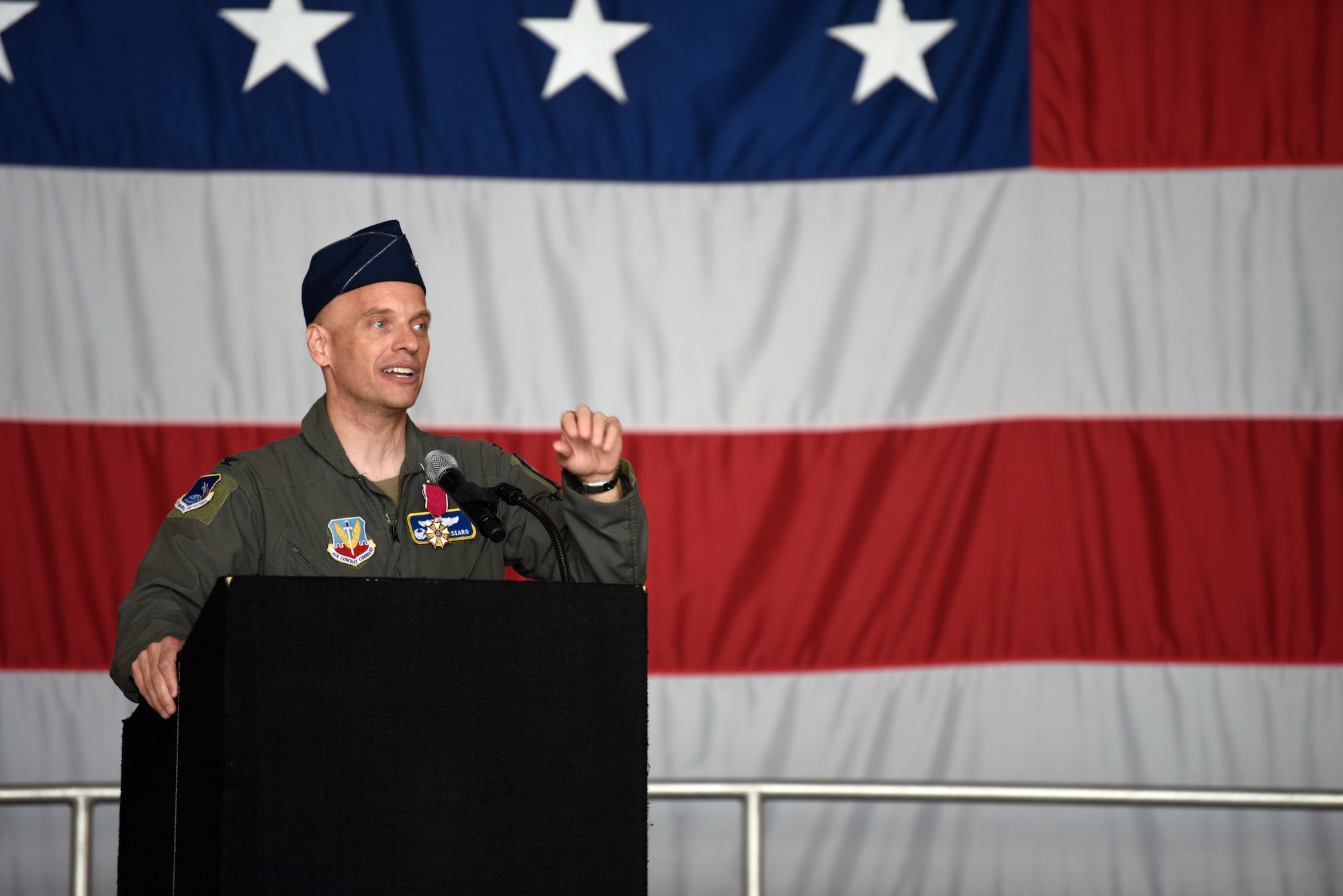 Col. Mark Massaro addresses the 495th Fighter Group during a change of command ceremony where he relinquished command to Col. John Galloway Jr. at Shaw Air Force Base, South Carolina, June 29, 2022. Brig. Gen. David Mineau, 15th Air Force vice commander, presided over the ceremony. (U.S. Air Force photo by Master Sgt. Andrew Satran)