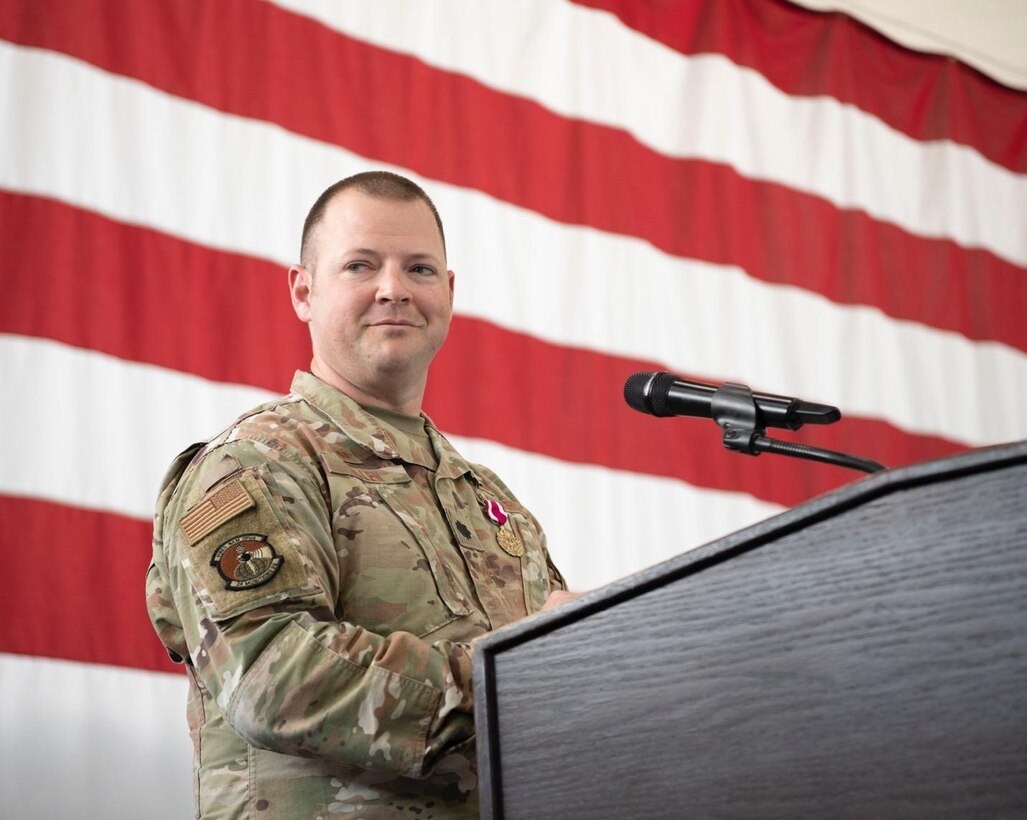 Lt. Col. Joshua Allen, the 28th Munitions Squadron outgoing commander, gives a speech during a change of command ceremony at Ellsworth Air Force Base, S.D. June 29, 2022.