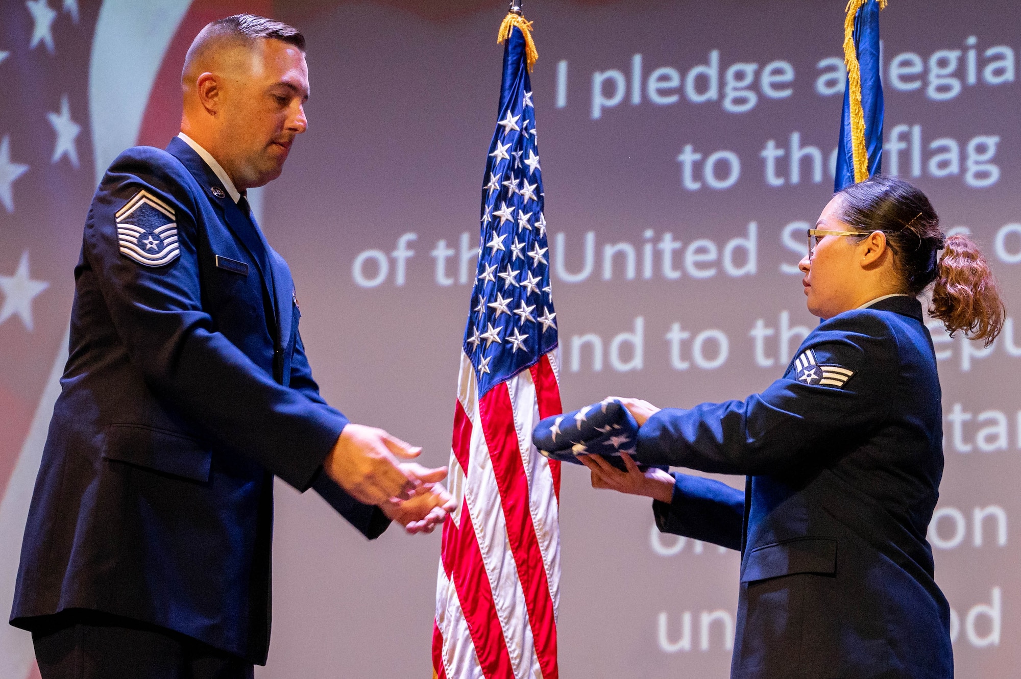 Airman holds flag