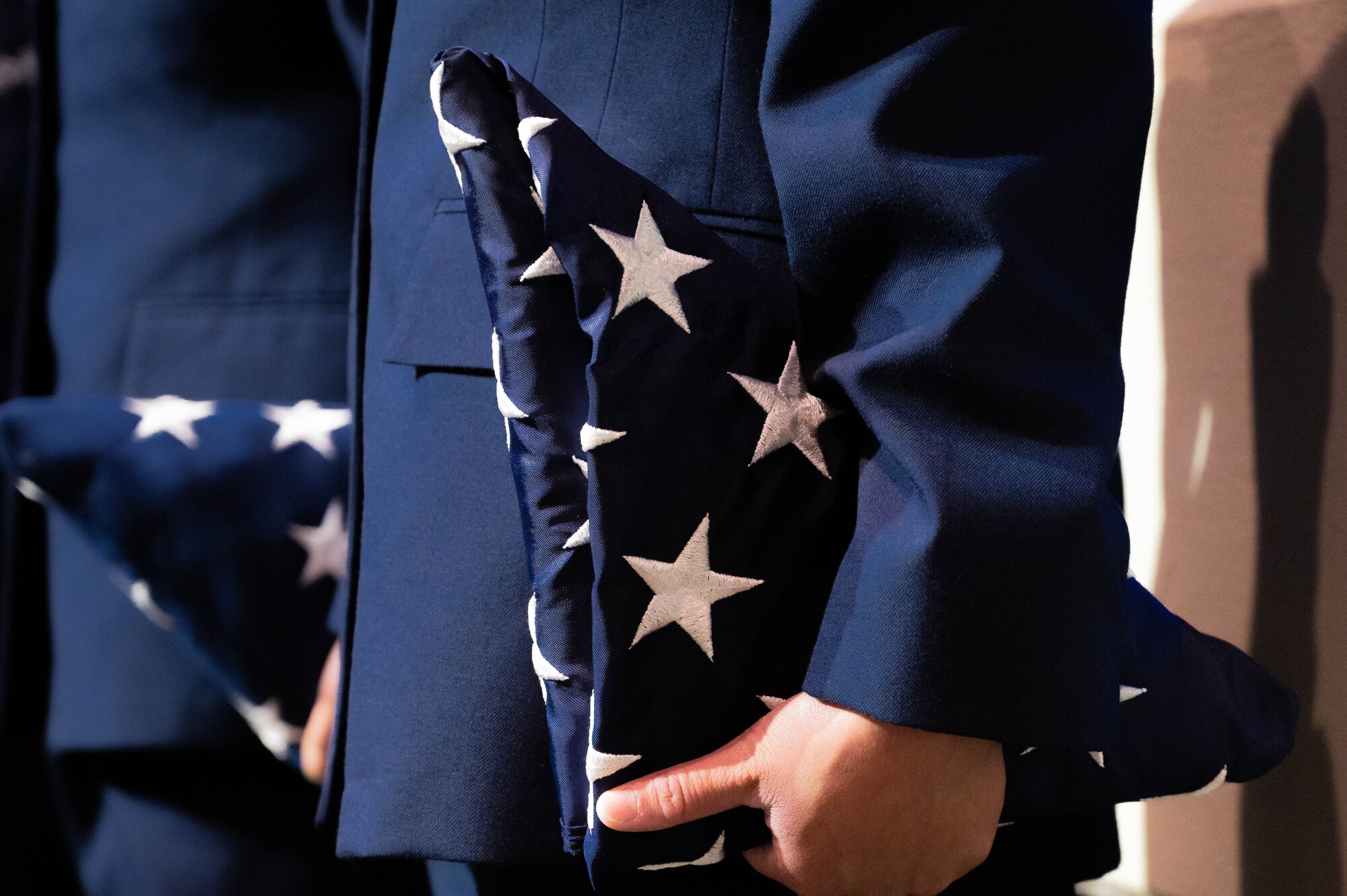 Airman holds flag