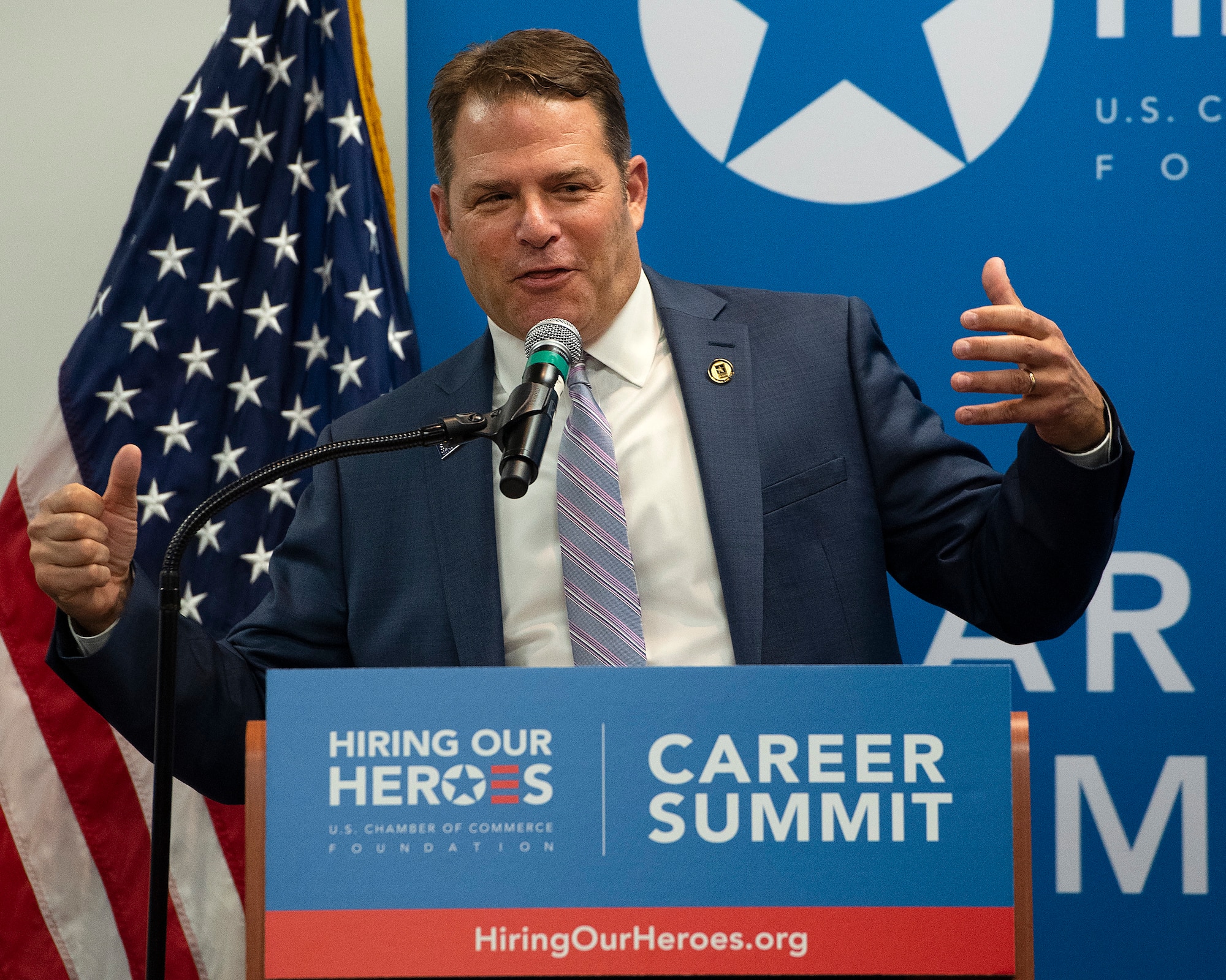 Adam Rocke, U.S. Chamber of Commerce, speaks at the start of the Hiring Our Heroes event June 22, 2022, at the Hope Hotel, Wright-Patterson Air Force Base, Ohio. Active duty Airmen, recent retirees and spouses attended three hours of class on the interview process, compensation issues and networking in the morning followed by a job fair with more than 50 companies in the afternoon. (U.S. Air Force photo by R.J. Oriez)