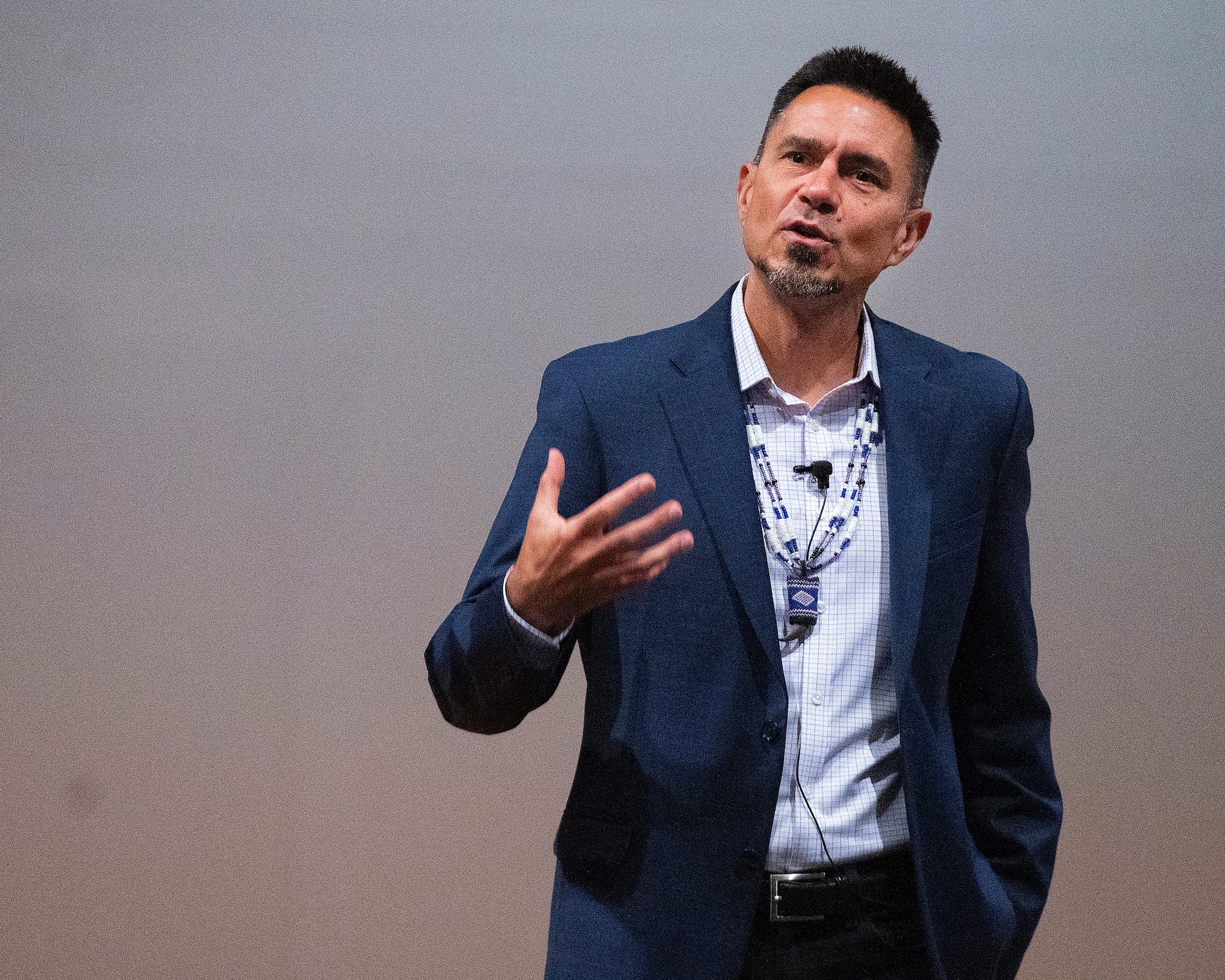 D.J. Vanas talks to Airmen about having the warrior spirit during his presentation June 24 at the Wright-Patterson Air Force Base Theater. The Ottawa Tribe member and former Air Force officer says tribal principles that led the first cultures in America can be applied today to lead organizations. (U.S. Air Force photo/R.J. Oriez)