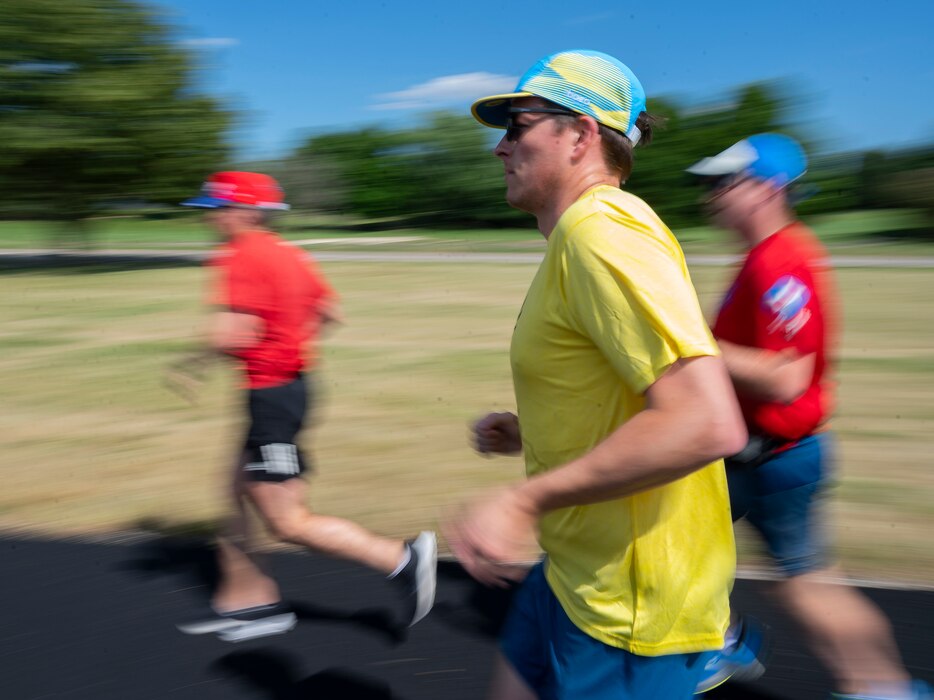 Wright-Patterson Air Force Base personnel run along Skeel Avenueon July 27 as part of a weekly gathering. 2022 marks the 26th annual Air Force Marathon. (U.S. Air Force photo by R.J. Oriez)