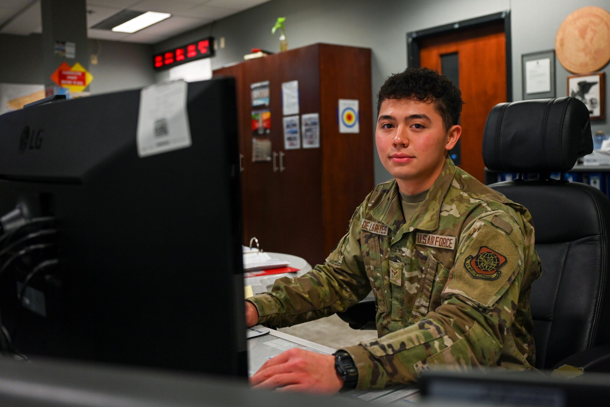 An Airman poses for a photo