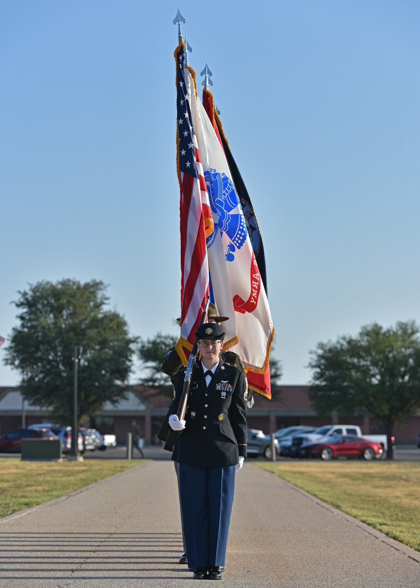 The Goodfellow Joint Service Color Guard prepares to present the colors during the 17th Training Group change of command at Goodfellow Air Force Base, Texas, June 30, 2022. The Joint Service Color Guard is responsible for presenting the National Colors during official ceremonies. (U.S. Air Force photo by Senior Airman Ashley Thrash)