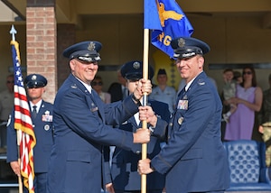 U.S. Air Force Col. Jason Kulchar, right, 17th Training Group incoming commander, assumes command from Col. Matthew Reilman, 17th Training Wing commander, during the 17th TRG change of command at Goodfellow Air Force Base, Texas, June 30, 2022. Change of commands are a military tradition representing the transfer of responsibilities from the outgoing commander to the incoming commander. (U.S. Air Force photo by Senior Airman Ashley Thrash)
