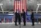 Col. Todd Randolph takes the guidon from Maj. Gen. Joel Jackson as he assumes command of the 316th Wing and the installation in Hanger 3 at Joint Base Andrews, Md., June 30, 2022.