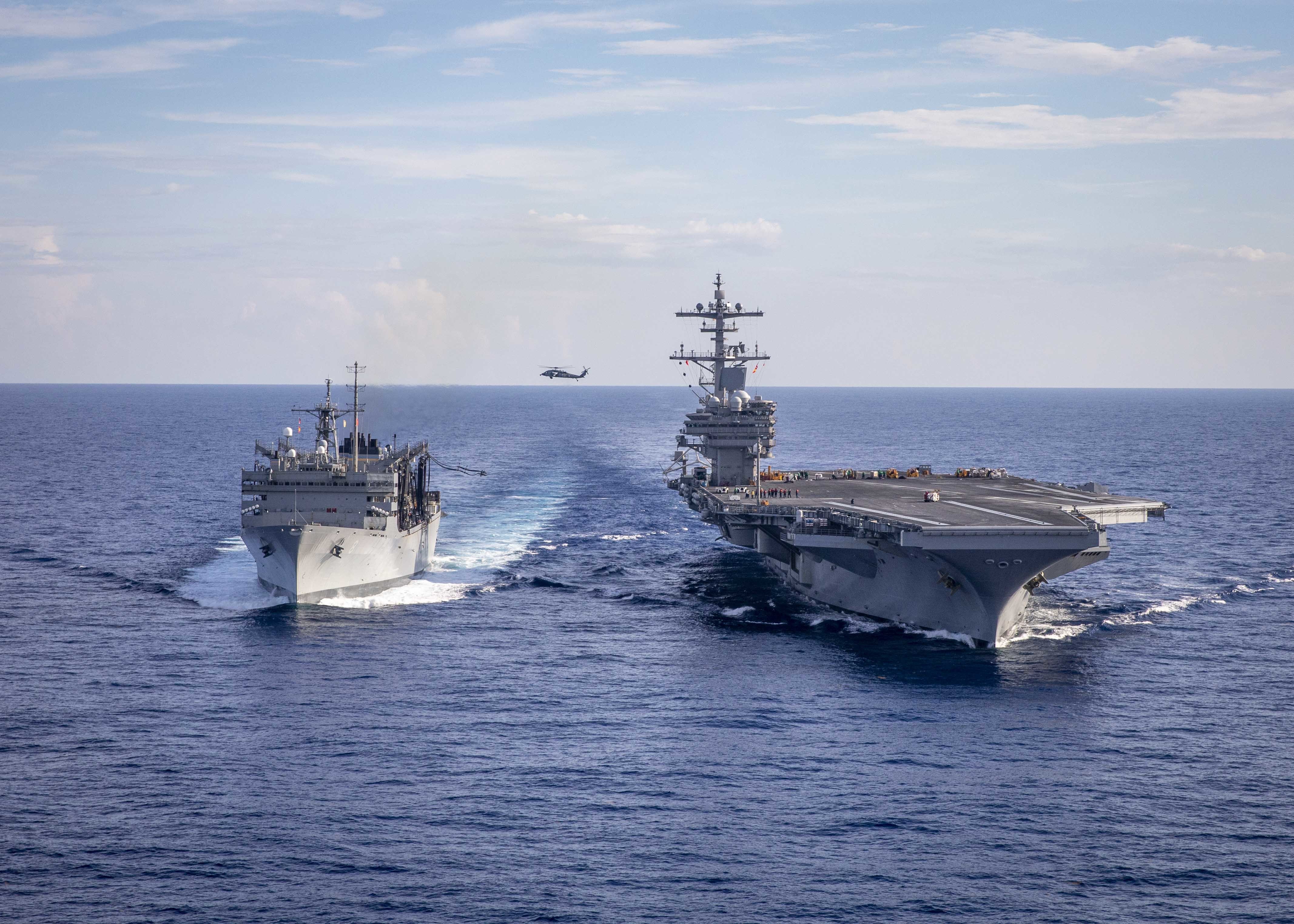 USS George H.W. Bush (CVN 77), Conducts a replenishment-at-sea with the Military Sealift Command fast combat support ship USNS Arctic (T-AOE 8), June 28, 2022.