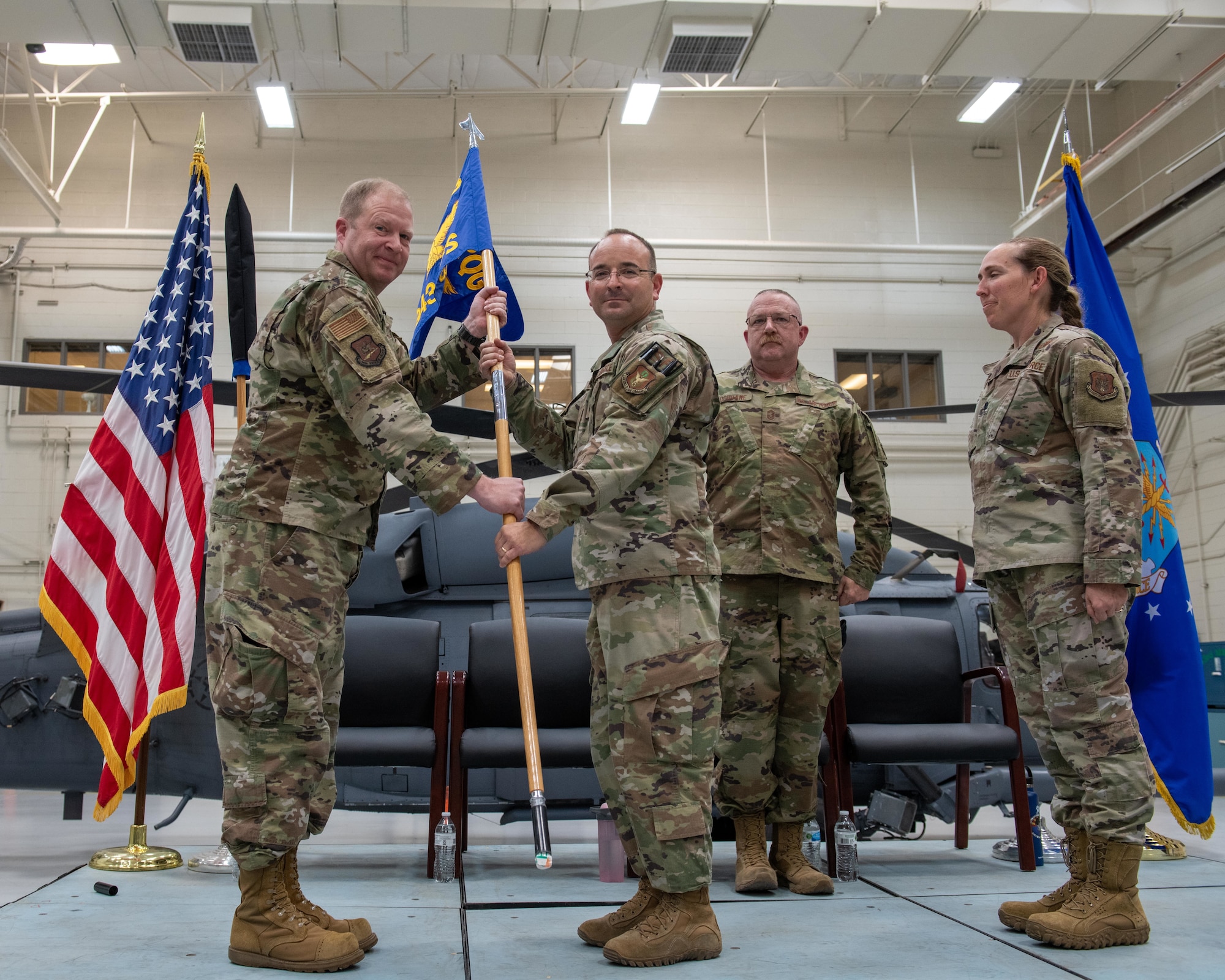 Lt. Col. Joseph Romeo, 943rd Security Forces commander, assumes command during a change of name ceremony at Davis-Monthan Air Force Base, Arizona, June 10, 2022. The 943rd SFS mission is to provide the most highly effective, cohesive, and disciplined security force defender professionals in the world. (U.S. Air Force photo by Senior Airman Nicole Koreen)