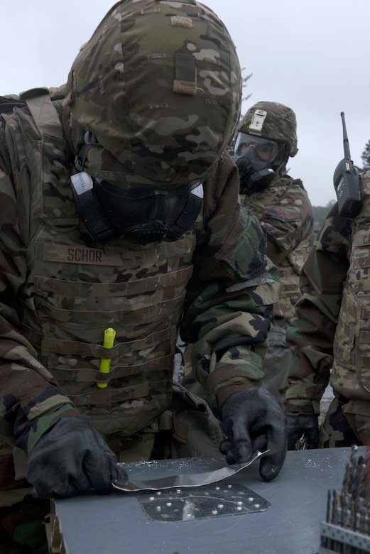 Amn. Basic Cooper Schor of the 193rd Special Operations Aircraft Maintenance Squadron, Middletown, Pennsylvania Air National Guard, repairs wing during a training exercise held at Fort Indiantown Gap, Annville, Pennsylvania June 23, 2022.