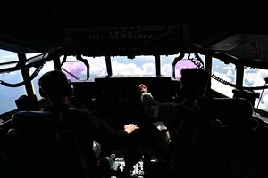 Pilots assigned to the 815th Airlift Squadron, fly a C-130J Super Hercules aircraft.