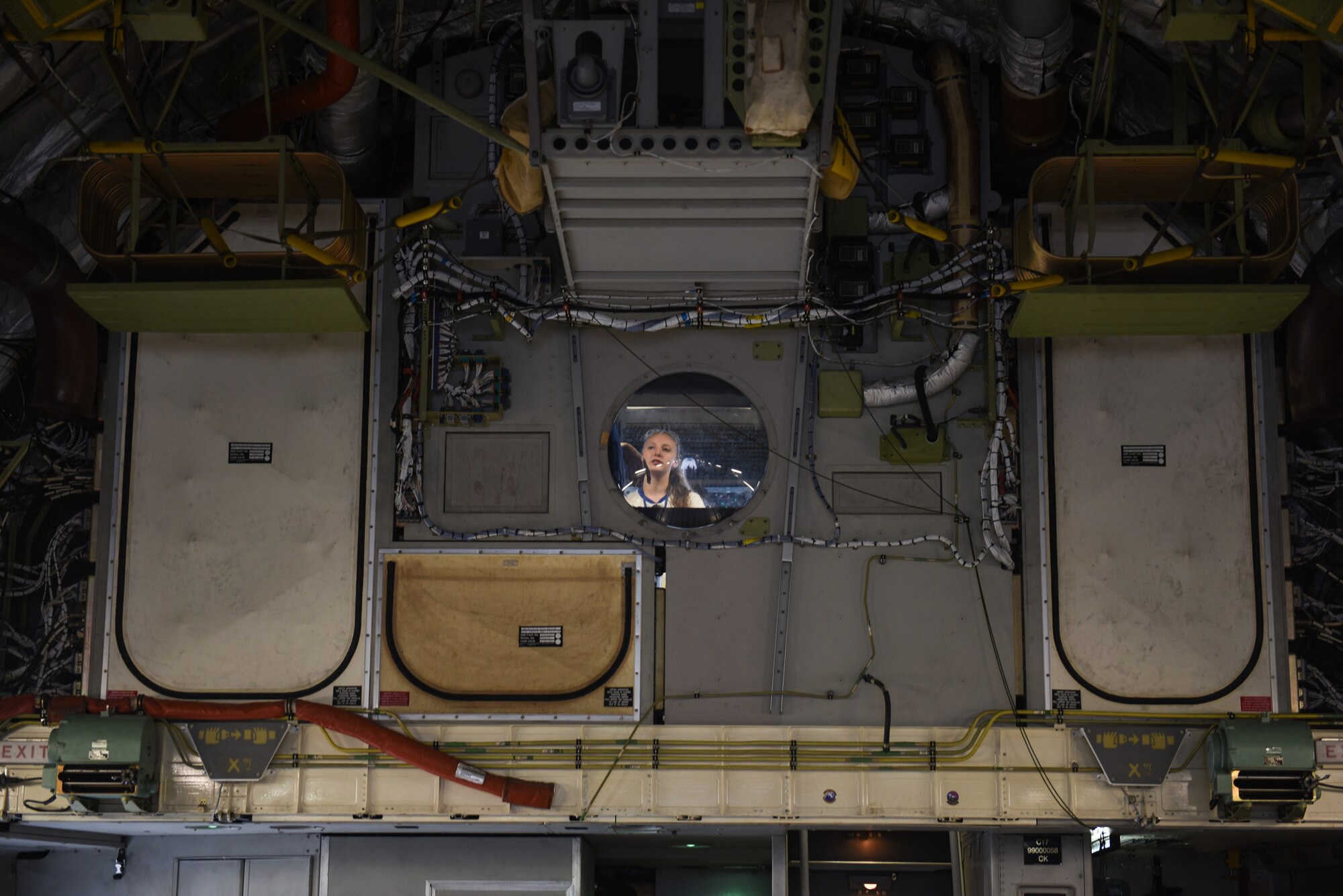 An attendee of the Northwest Youth Leadership Conference tours a C-17 Globemaster III as part of 62nd Airlift Wing’s Aviation Inspiration and Mentorship (AIM) Wing event at Joint Base Lewis-McChord, Washington, June 28, 2022. AIM Wing is a community outreach program to inform, influence and inspire the next generation of Air Force aviators. (U.S. Air Force photo by Master Sgt Julius Delos Reyes)