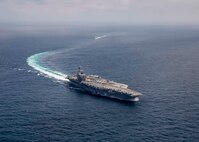 The aircraft carrier USS George H.W. Bush (CVN 77) transits the Atlantic Ocean, June 13, 2022.