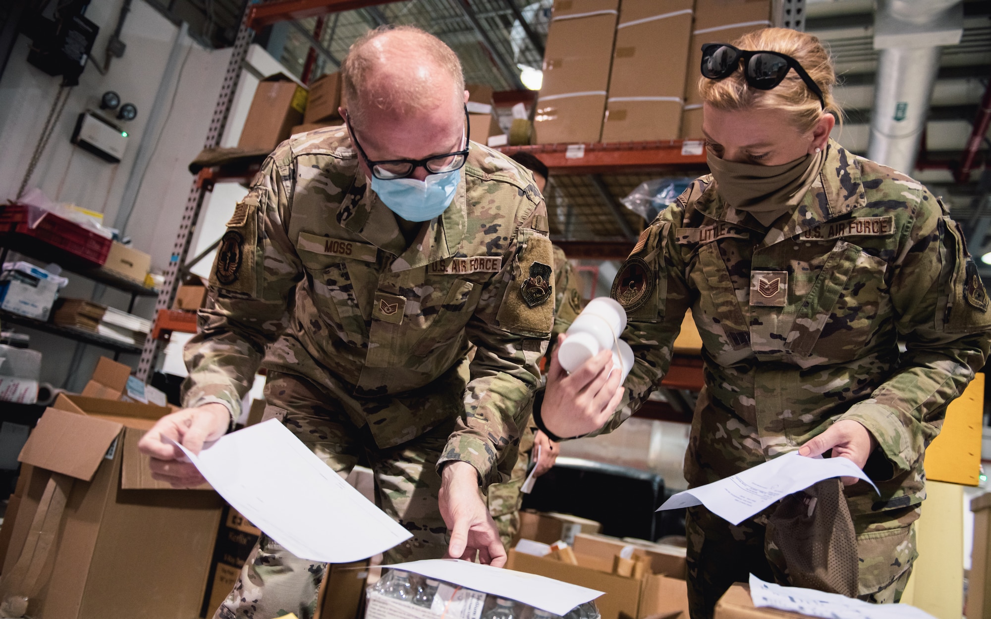 Airman distributes supplies.