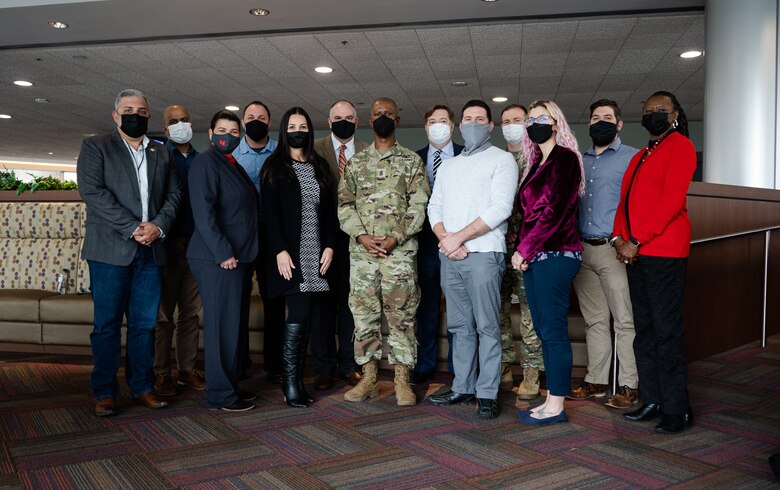 The U.S. Army Corps of Engineers' senior enlisted adviser Command Sgt. Maj. Patrickson Toussaint poses with leaders from the Jacksonville District Leadership Development Program II.