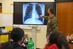 fter an 18-month pause due to the COVID-19 pandemic, Naval Medical Center Camp Lejeune is reviving their STEM outreach with local area schools. On February 16, anatomy and physiology students at Lejeune High School aboard Marine Corps Base Camp Lejeune got a close-up look at what a heartbeat looks like during an echocardiogram presentation from NMCCL staff.