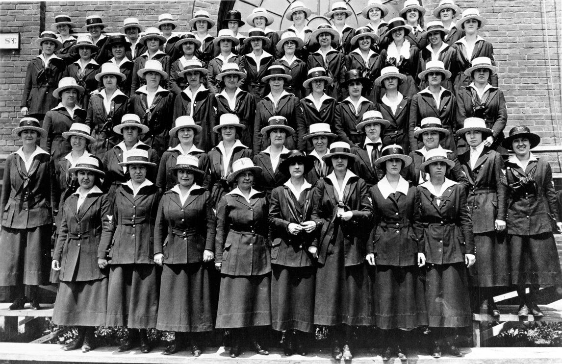 Women in uniform standing in group for picture