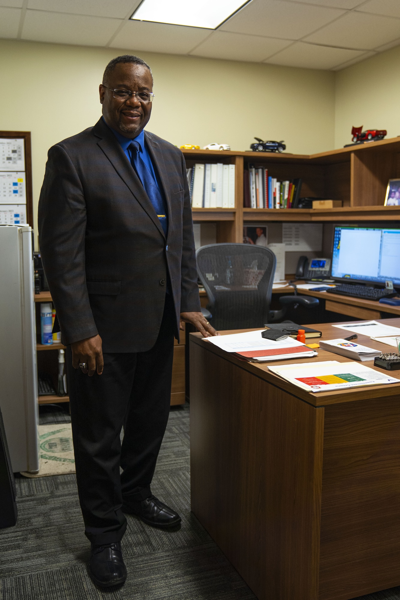 Kurt Higgins, 81st Training Support Squadron faculty development chief, poses for a photo inside Allee Hall at Keesler Air Force Base, Mississippi, Jan 19, 2022. Faculty development creates and instructs Community College of the Air Force accredited courses. (U.S. Air Force photo by Senior Airman Kimberly L. Mueller)