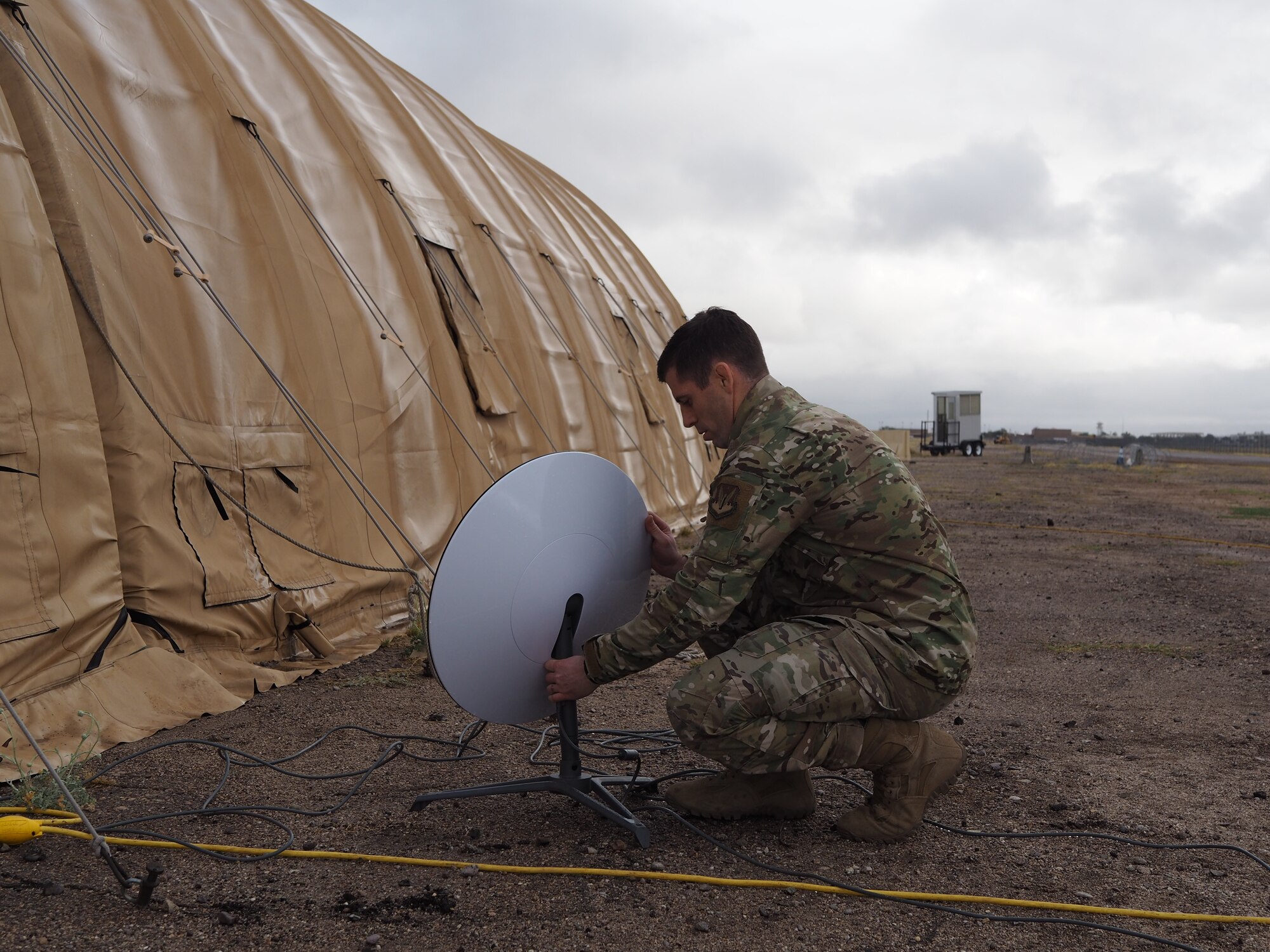 Photo of Starlink communication satellite dish in a simulated austere location