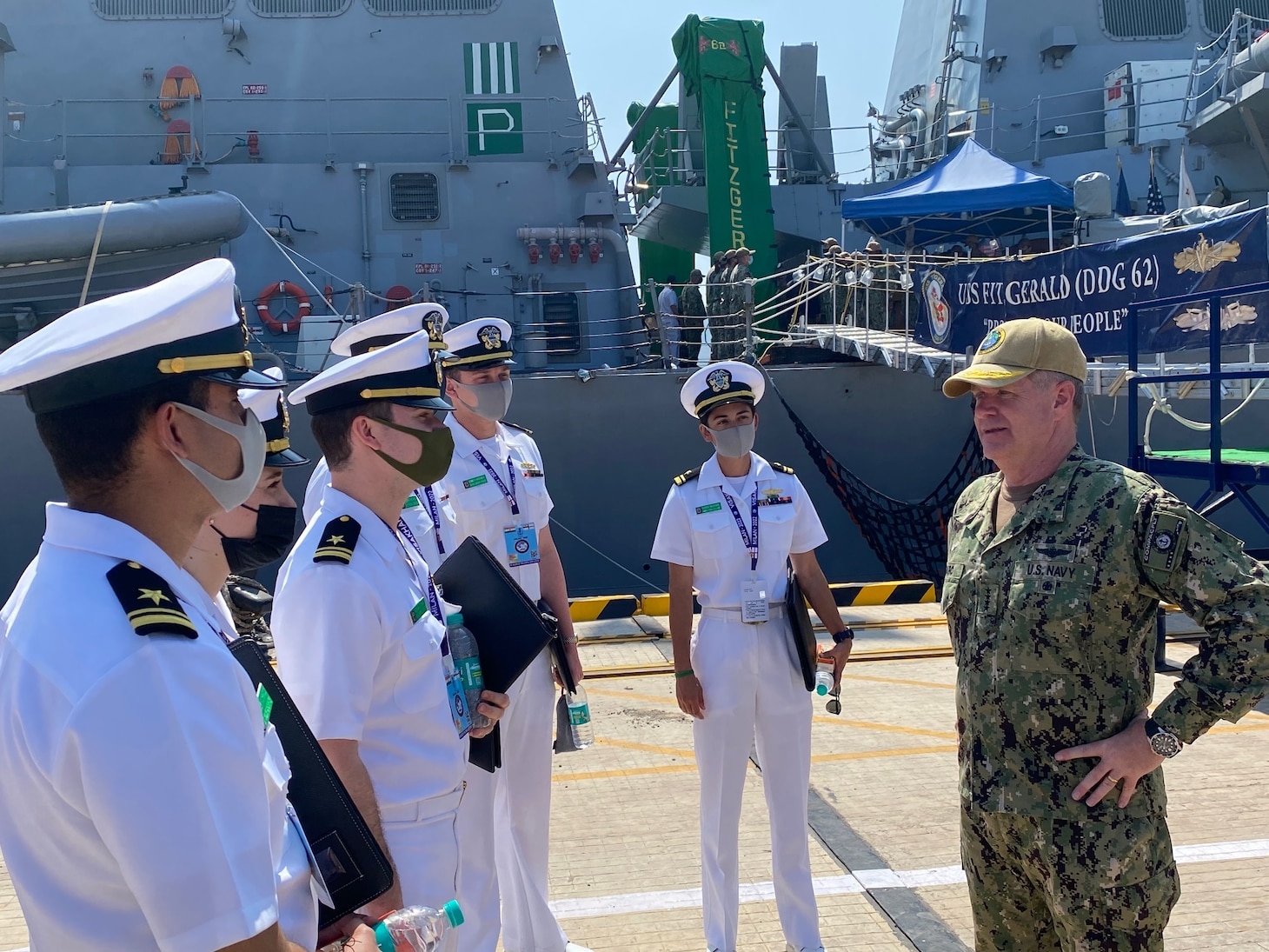 Adm. Samuel Paparo, commander, U.S. Pacific Fleet, visits with the crew of USS Fitzgerald (DDG 62).