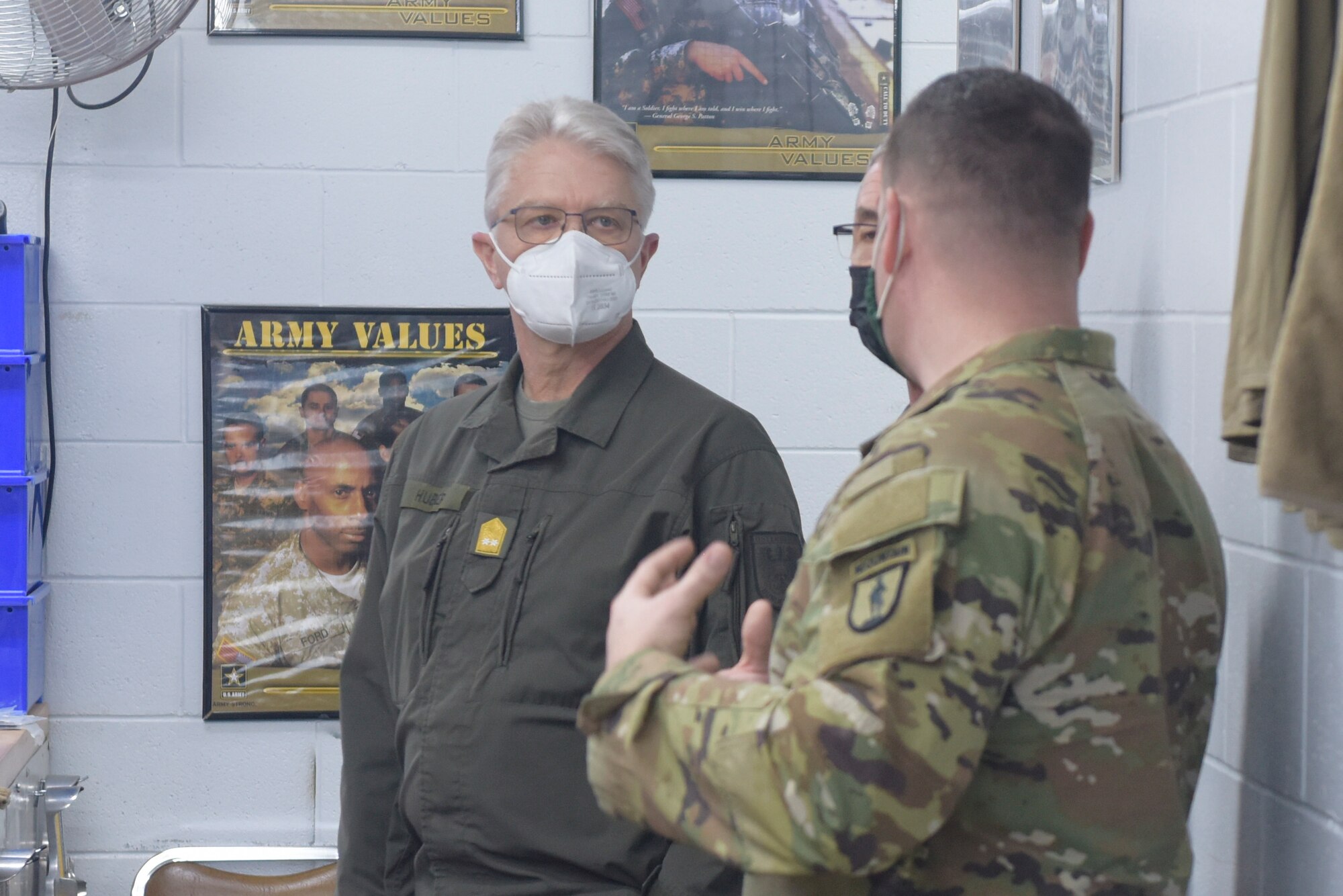 U.S. Army Lt. Col. Steve Gagner, commander, Army Mountain Warfare School, 124th Regiment (Regional Training Institute), Vermont National Guard, escorts an Austrian military delegation through the AMWS at Camp Ethan Allen Training Site, Jericho, Vermont, Feb. 14, 2022. Austria is scheduled to be Vermont’s newest state partner under the State Partnership Program.