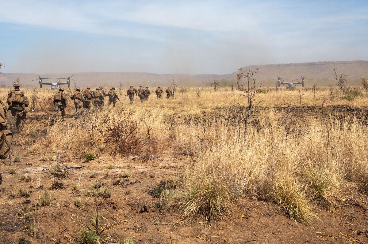 Troops move across the desert.