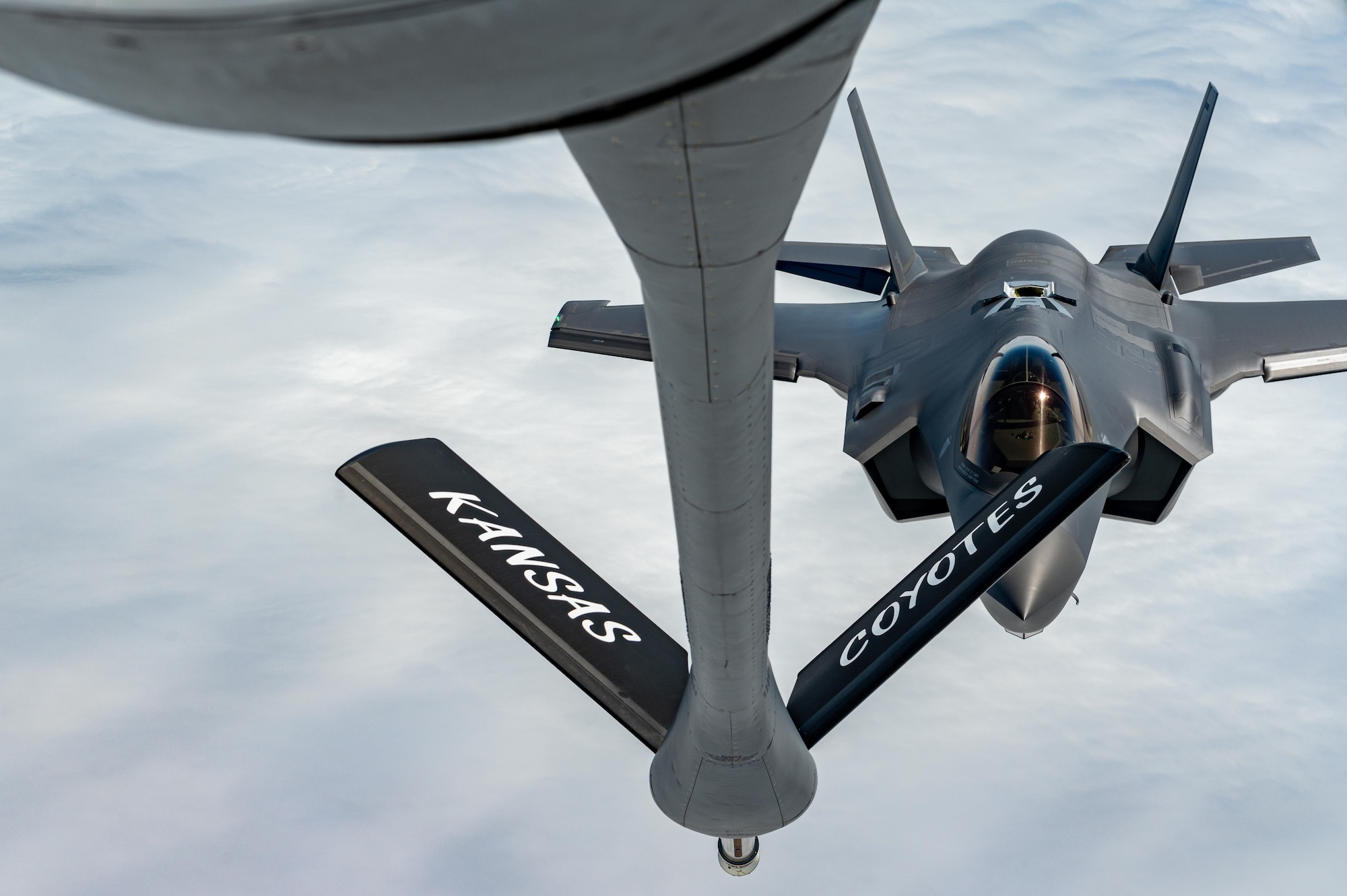 An F-35A Lightning II approaches a KC-135 Stratotanker to receive fuel