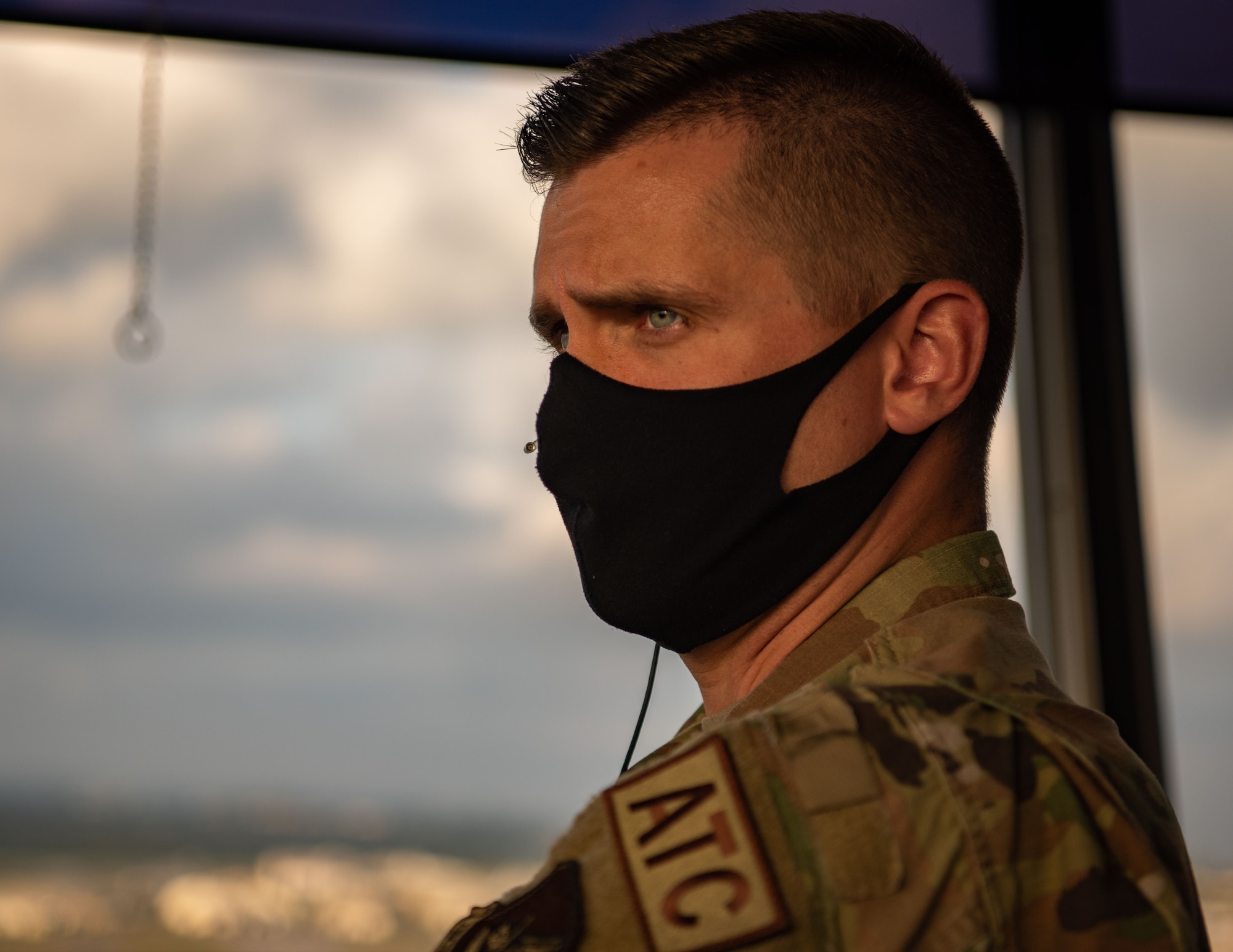 An Airman looks into the distance.