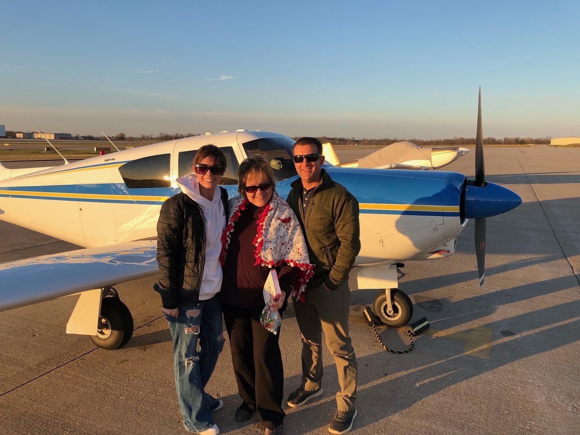 U.S. Air Force Lt. Col. Gregory Stack, an A-10 pilot with the 442d Operations Group, poses with Falesha Wise (left) and her mother in front of his aircraft during an Angel Flight December 22, 2021 in Saint Louis, Mo. Falesha, a Springfield, Mo., native, is a loving wife and mom of three who is currently fighting cancer for the third time and is enrolled in a clinical trial in St Louis. (Photo courtesy of Lt. Col. Gregory Stack)