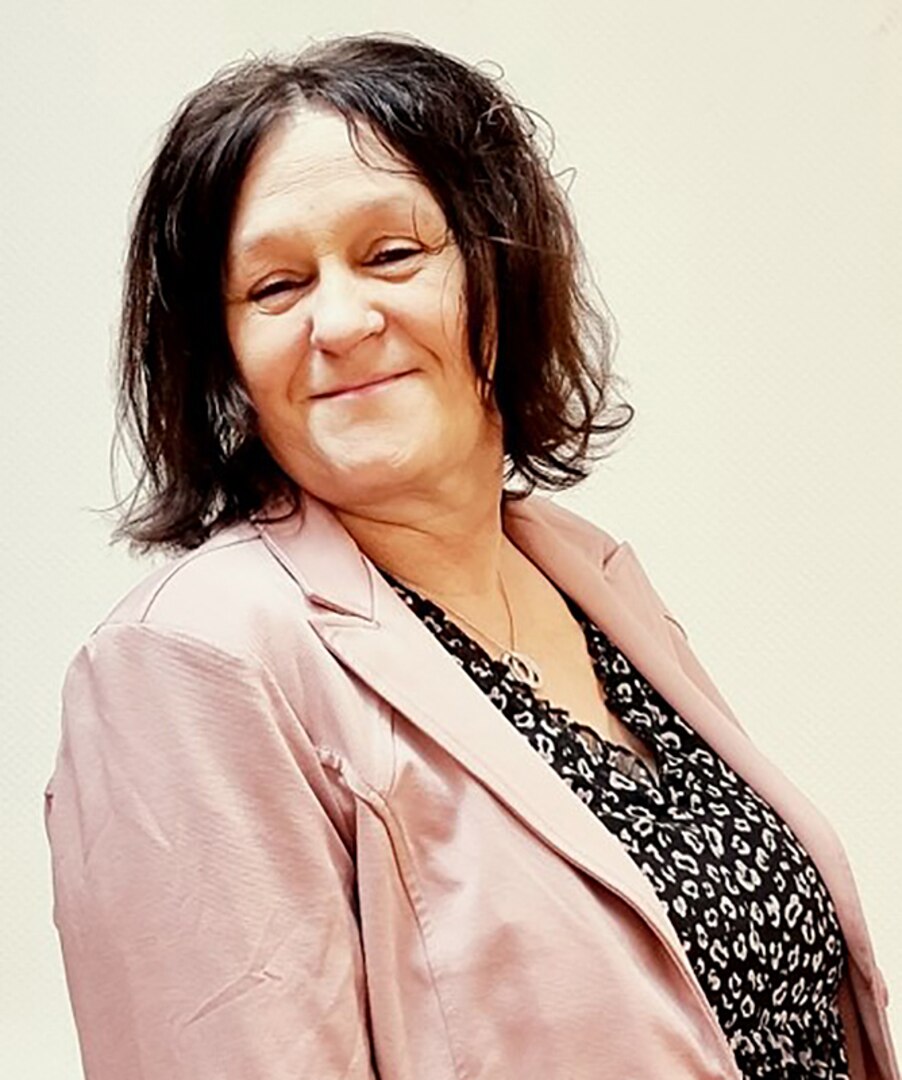 A woman poses.