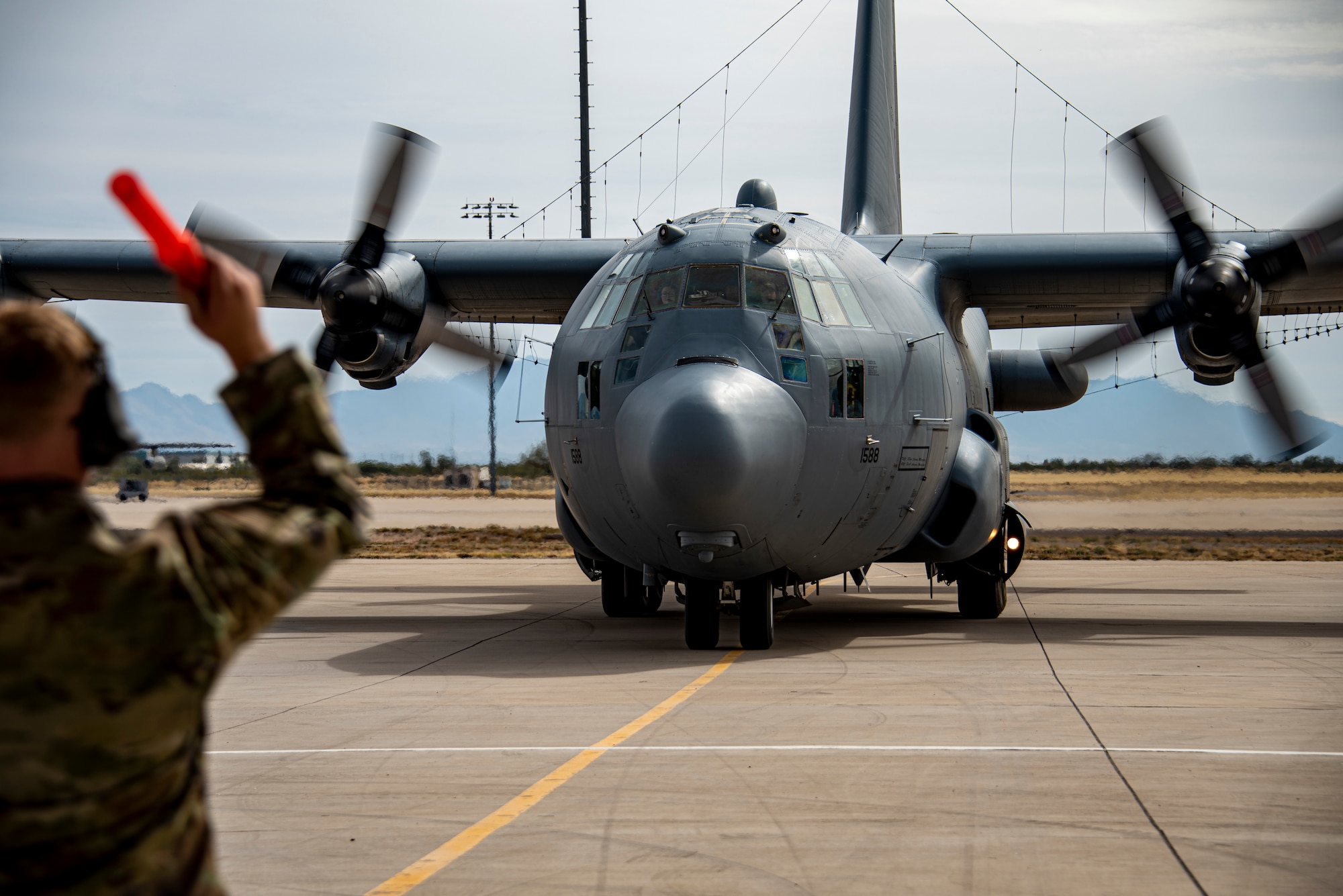 Person taxis in an aircraft on the flightline.
