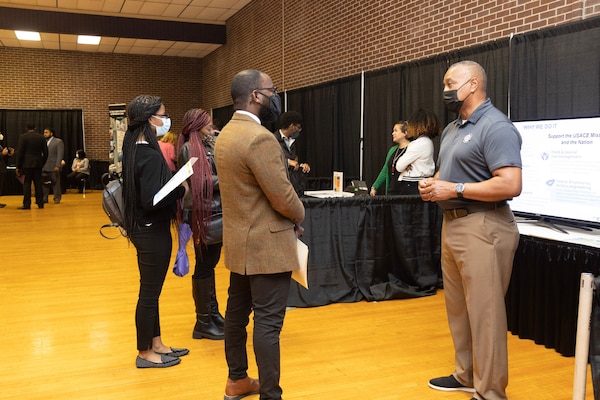 Fulton Carson, a computer scientist at the U.S. Army Engineer Research and Development Center (ERDC) Coastal and Hydraulics Laboratory, speaks to several Alcorn State University students at ERDC Day on February 23, 2022. The event, which featured a mini career fair, exposed Alcorn students to ERDC career opportunities.