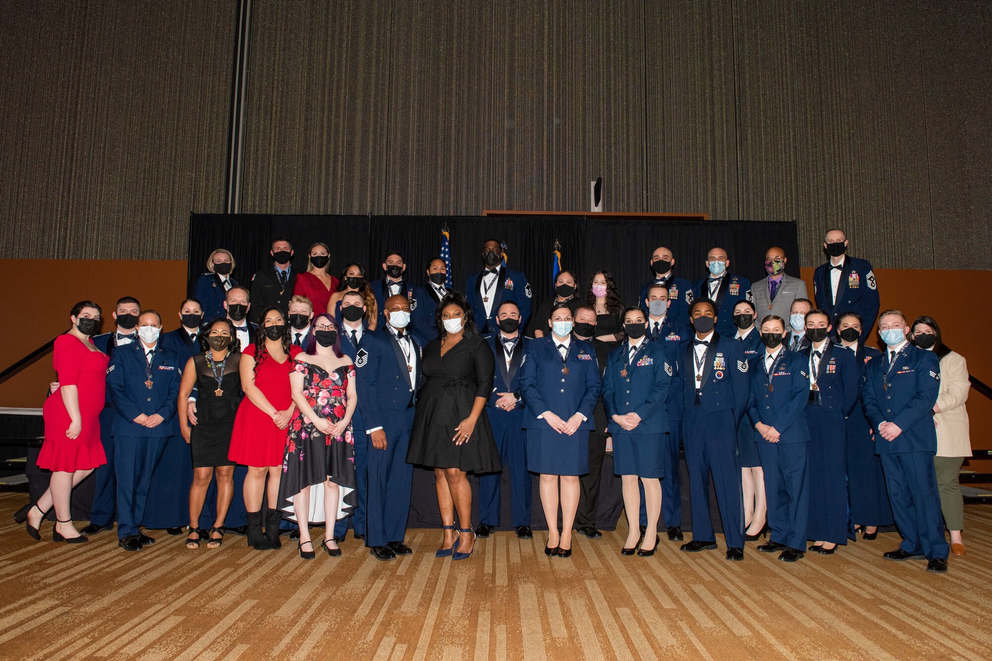 Award nominees and their guests pause for a photo.