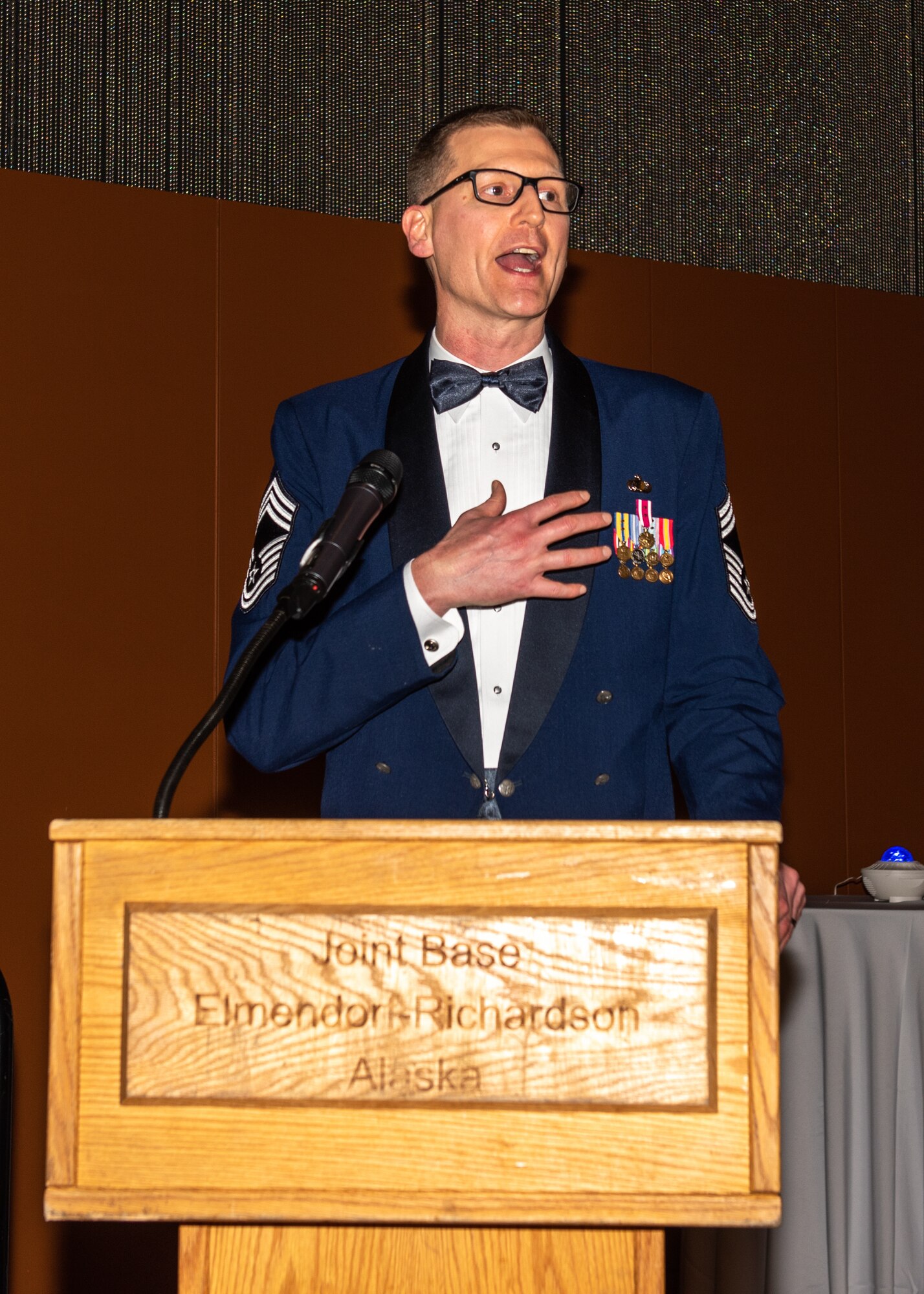 The guest speaker addresses the ceremony attendees.