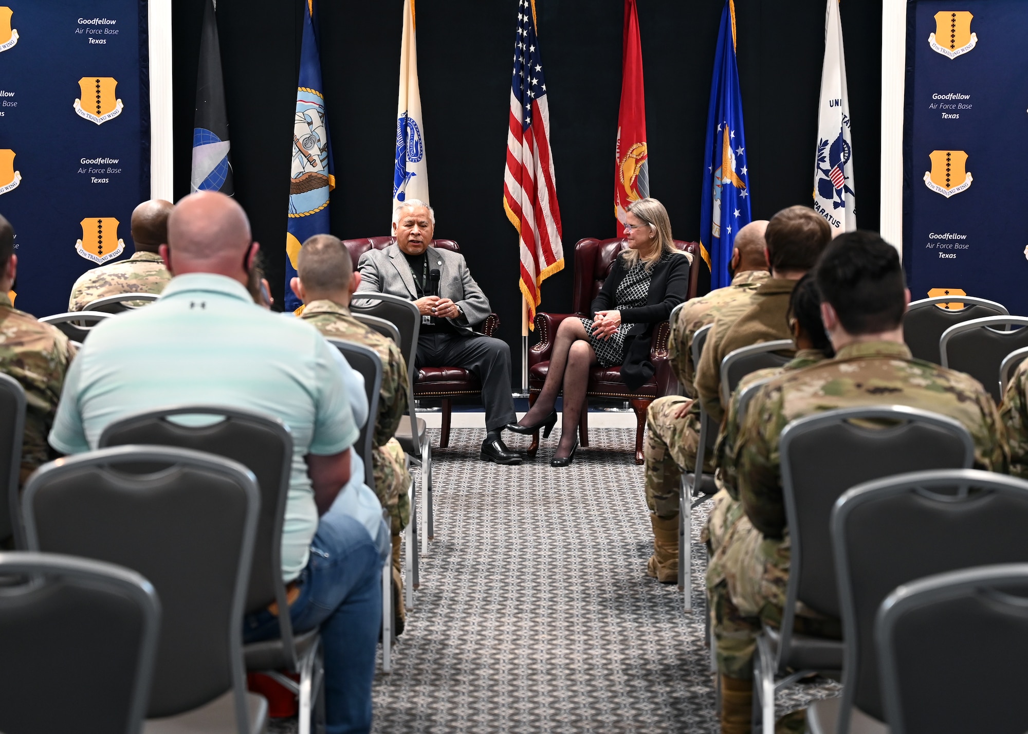 John “Pepe” Soto, senior defense analyst, and Jonna Doolittle Hoppes, The Doolittle Foundation founder and executive director, share General Jimmy Doolittle’s story at the Powell Event Center, Goodfellow Air Force Base, Texas, Feb. 25, 2022. Soto and Hoppes used Doolittle’s story as an example of a great leader who inspired change. (U.S. Air Force photo by Senior Airman Ethan Sherwood)