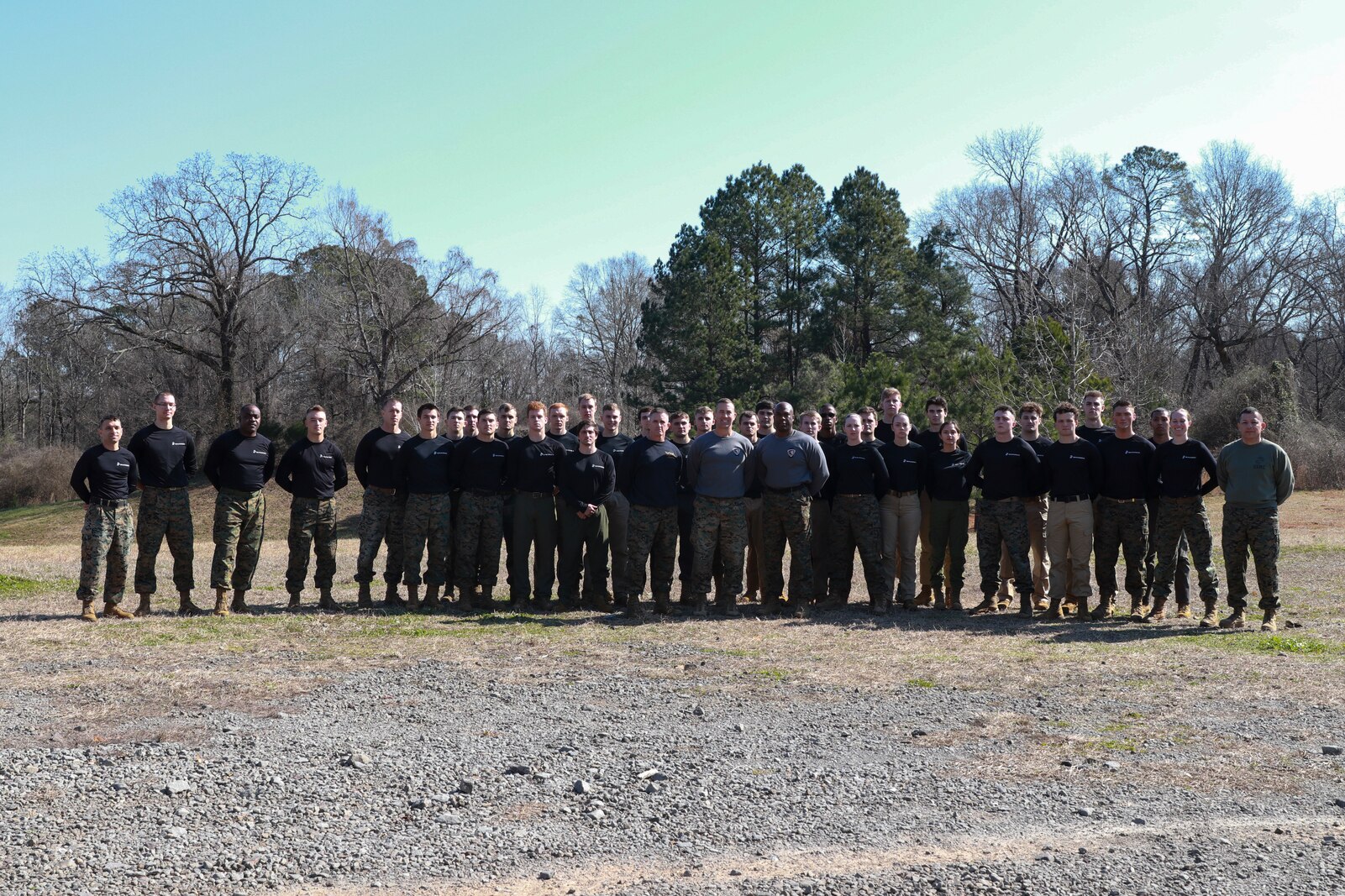 U.S. Marine officer candidates with Officer Selection Office Tuscaloosa stand for a photo with the leadership of 6th Marine Corps District after a pool function at Sokol Park in Tuscaloosa Alabama, February 12, 2022. The candidates conducted this pool function in order to help prepare them both physically and mentally to become U.S. Marine Corps officers.