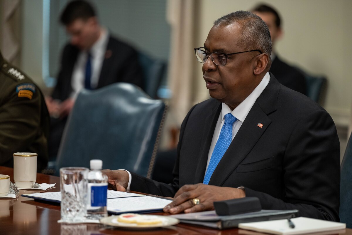 The secretary of defense speaks during a meeting.