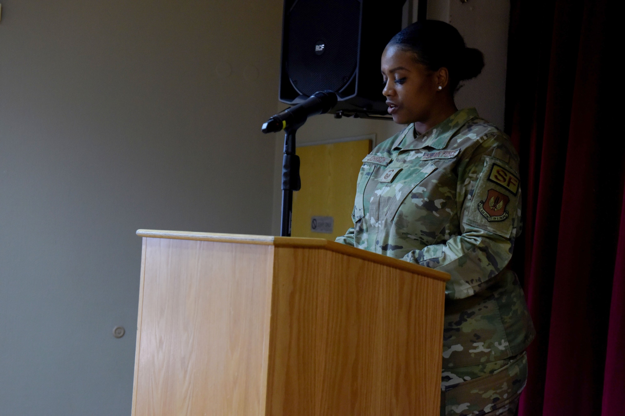 Woman speaks at a podium