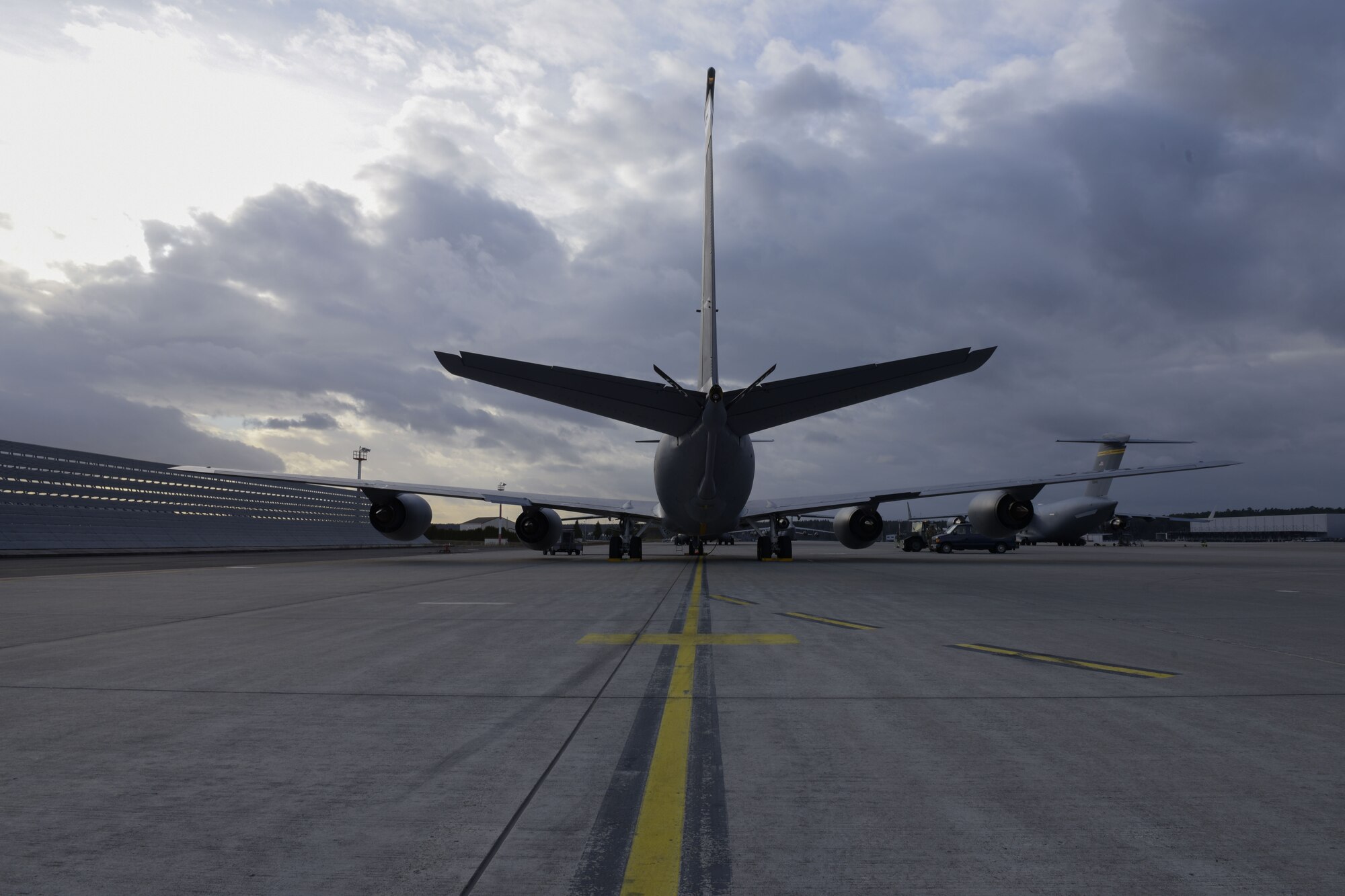 An aircraft sits on the flightline