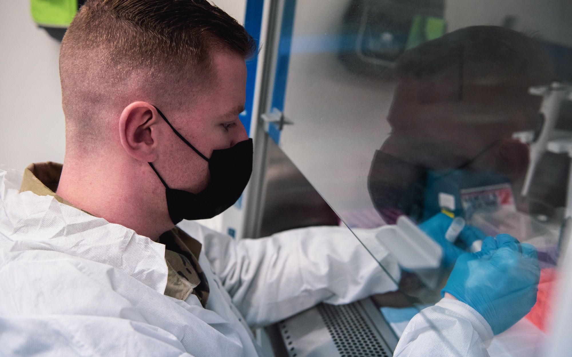 Airman performs a blood test.