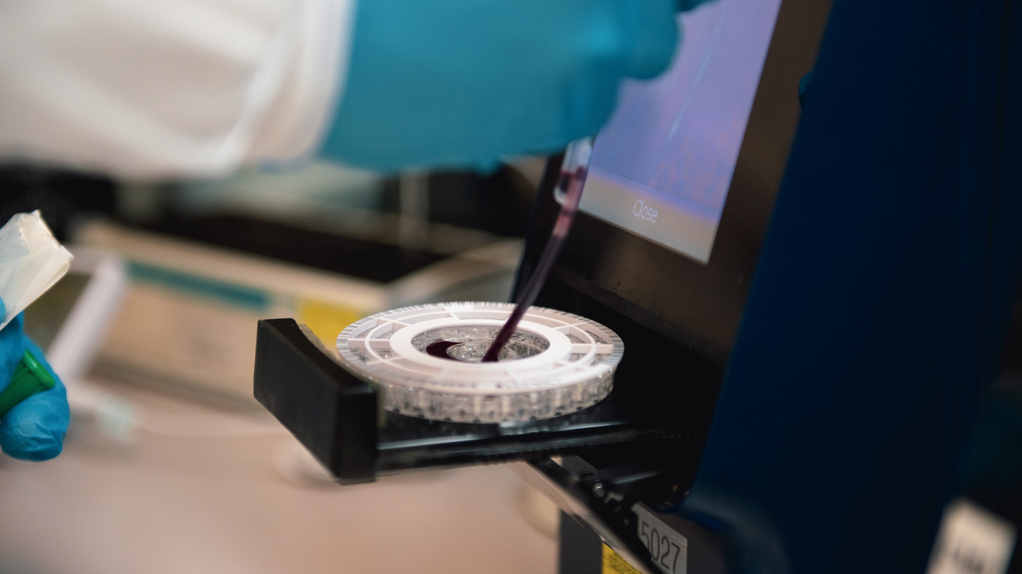 Airman tests a blood sample.