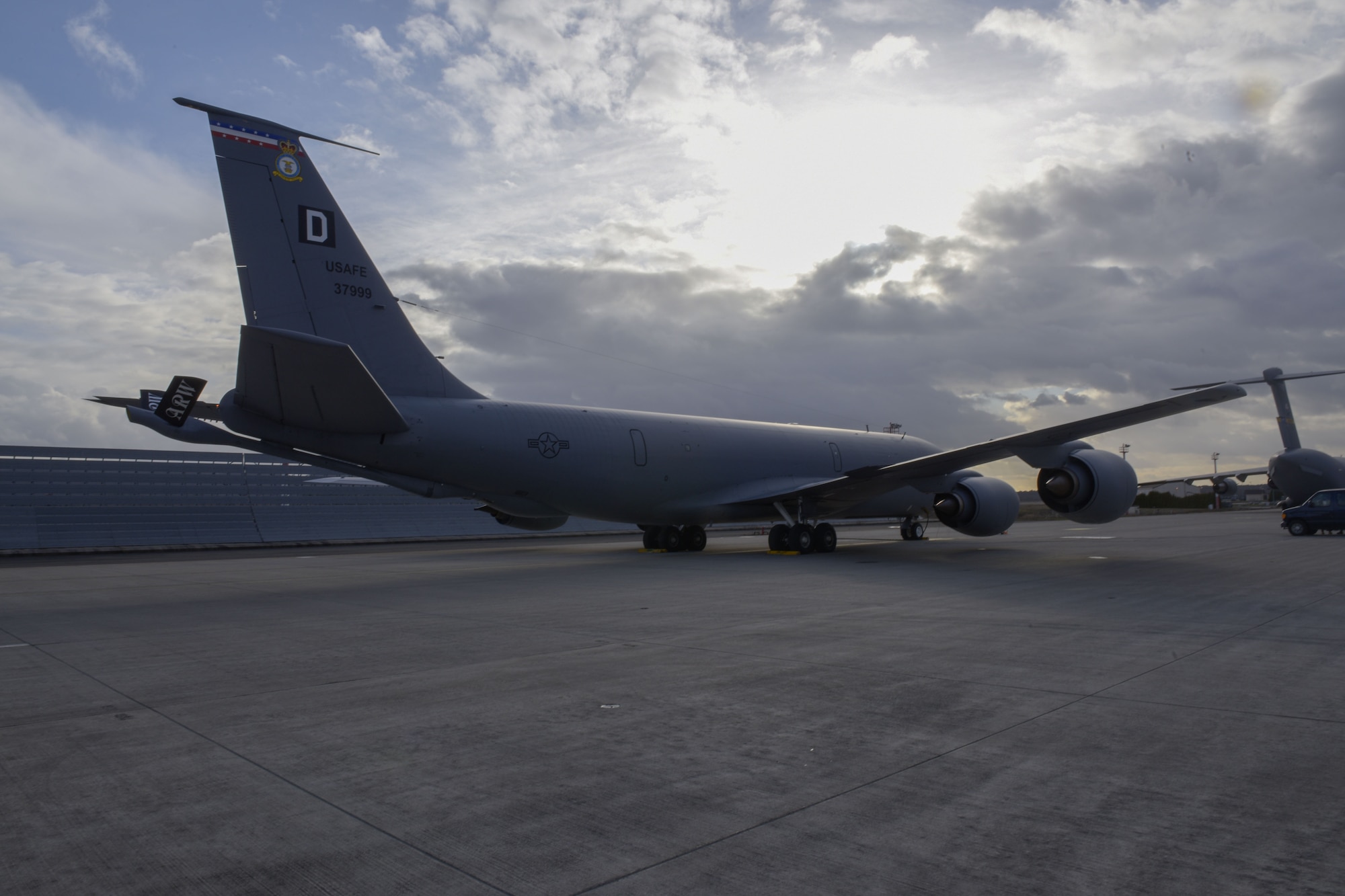 An aircraft sits on the flightline