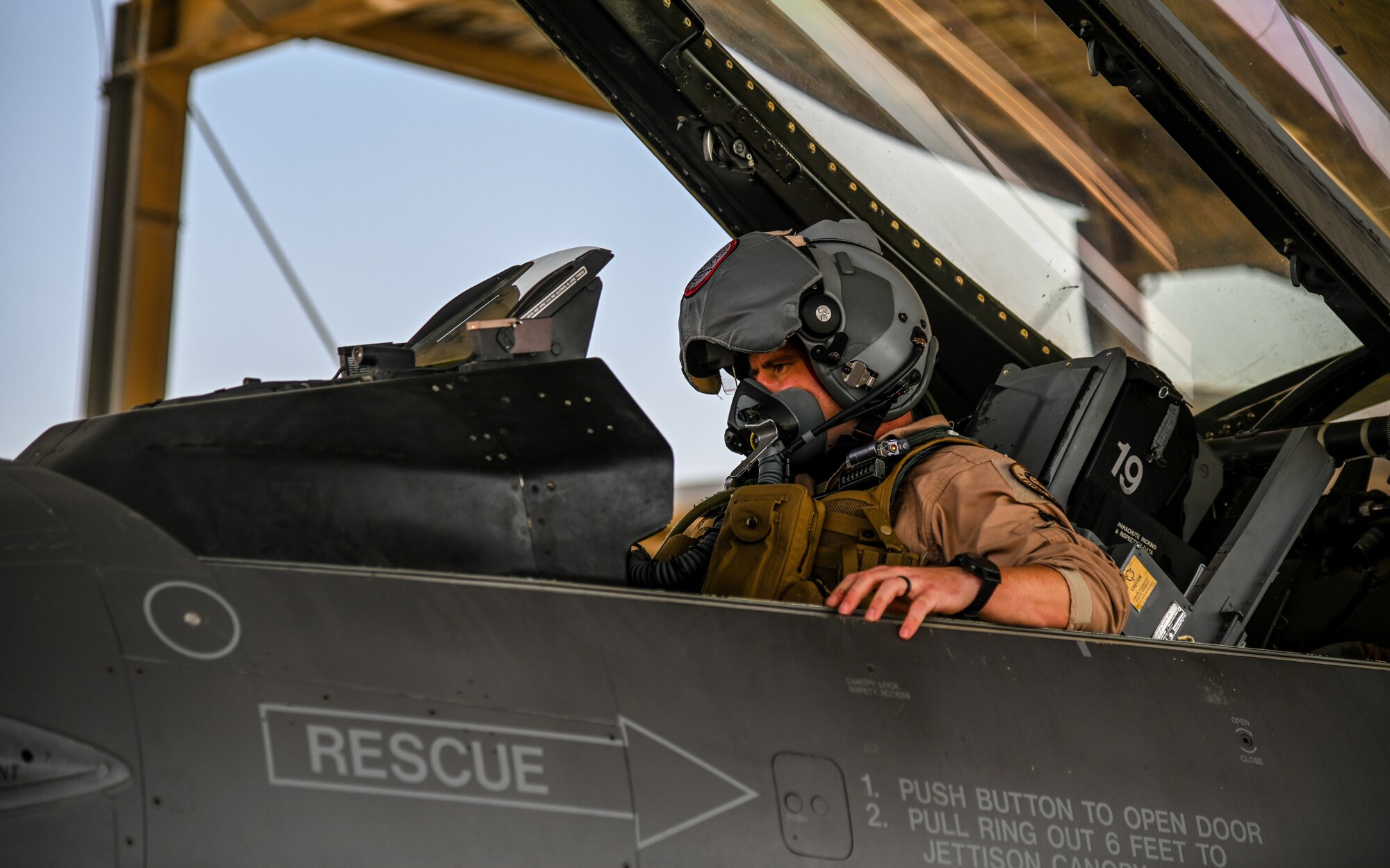 A 176th Expeditionary Fighter Squadron pilot, sits in the cockpit of an F-16 Fighting Falcon before take off at King Abdulaziz Air Base, Kingdom of Saudi Arabia, Feb. 14, 2022. Spears of Victory is a multinational large force air exercise led by the Royal Saudi Air Force. (U.S. Air Force photo by Staff Sgt. Christina A. Graves)