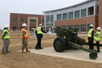 Governor christens howitzer, tours new Va. Guard headquarters site