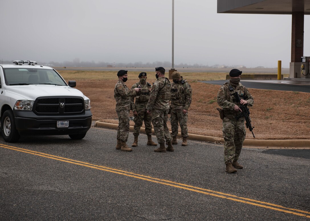 Airmen with the 633d Security Forces Squadron identify possible vulnerabilities within their protocols during an exercise at Joint Base Langley-Eustis, Va., Feb. 25, 2022.
