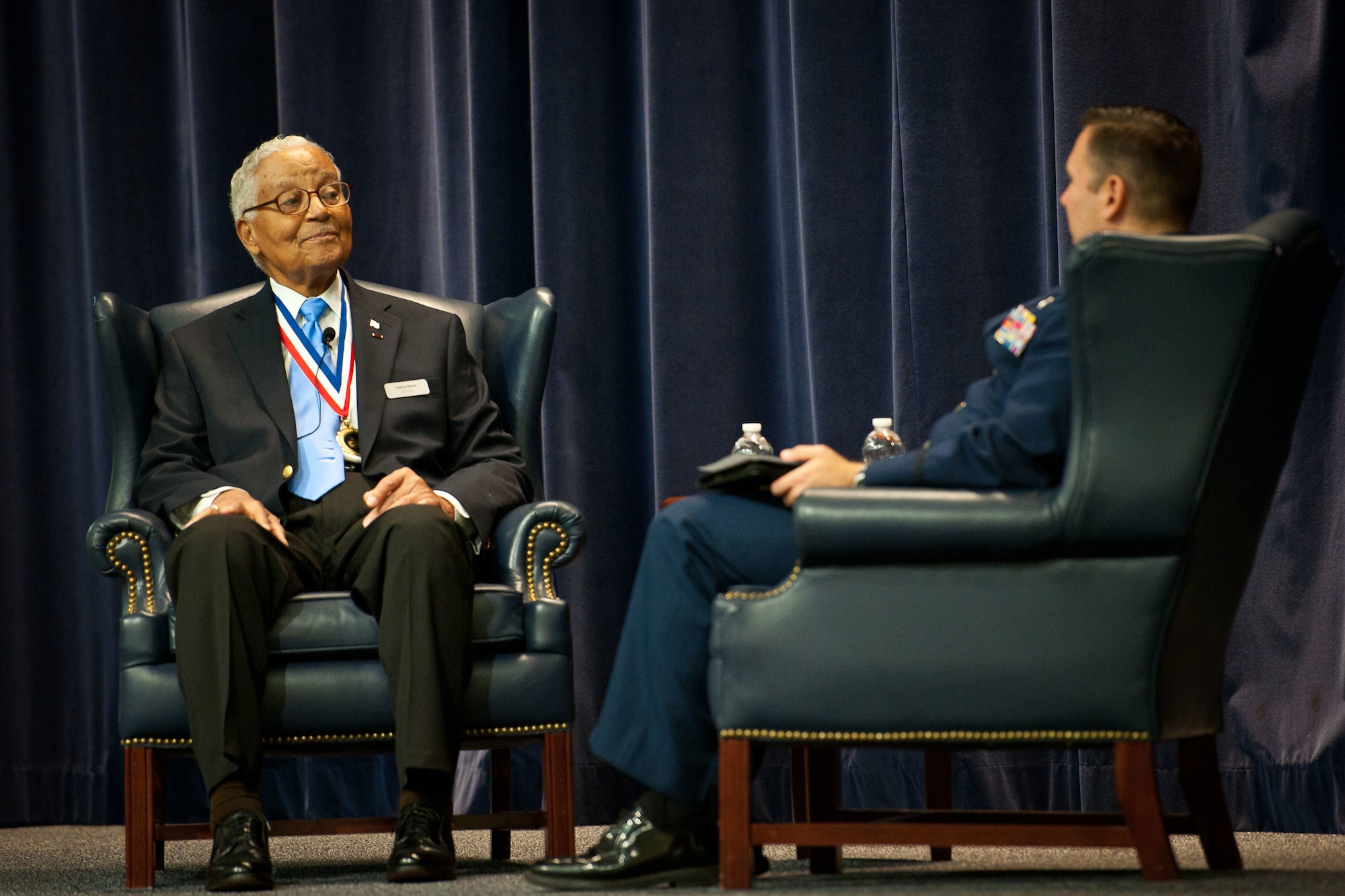 Col Charles E. McGee, retired, is interviewed by ACSC Student, Maj Daniel Thompson during the 2013 Gather of Eagles at the Air Command and Staff College Thursday 6 May 2013. Col McGee started his military career breaking barriers with the 99th Fighter Squadron of the 332nd Fighter Group, the famed "Tuskegee Airmen". His flying career continued during Korea and Vietnam, earning the highest three-war total for fighter missions of any Air Force Aviator. McGee was recognized with the Congressional Gold Medal of Honor, one of the nation's highest civilian awards.
Gathering of Eagles is a year long, student-run research elective at Air Command and Staff College, which through biographical studies and personal interviews with the student-selected Eagles collects, educates and advocates air, space and cyberspace history.USAF Photograph by Donna L. Burnett